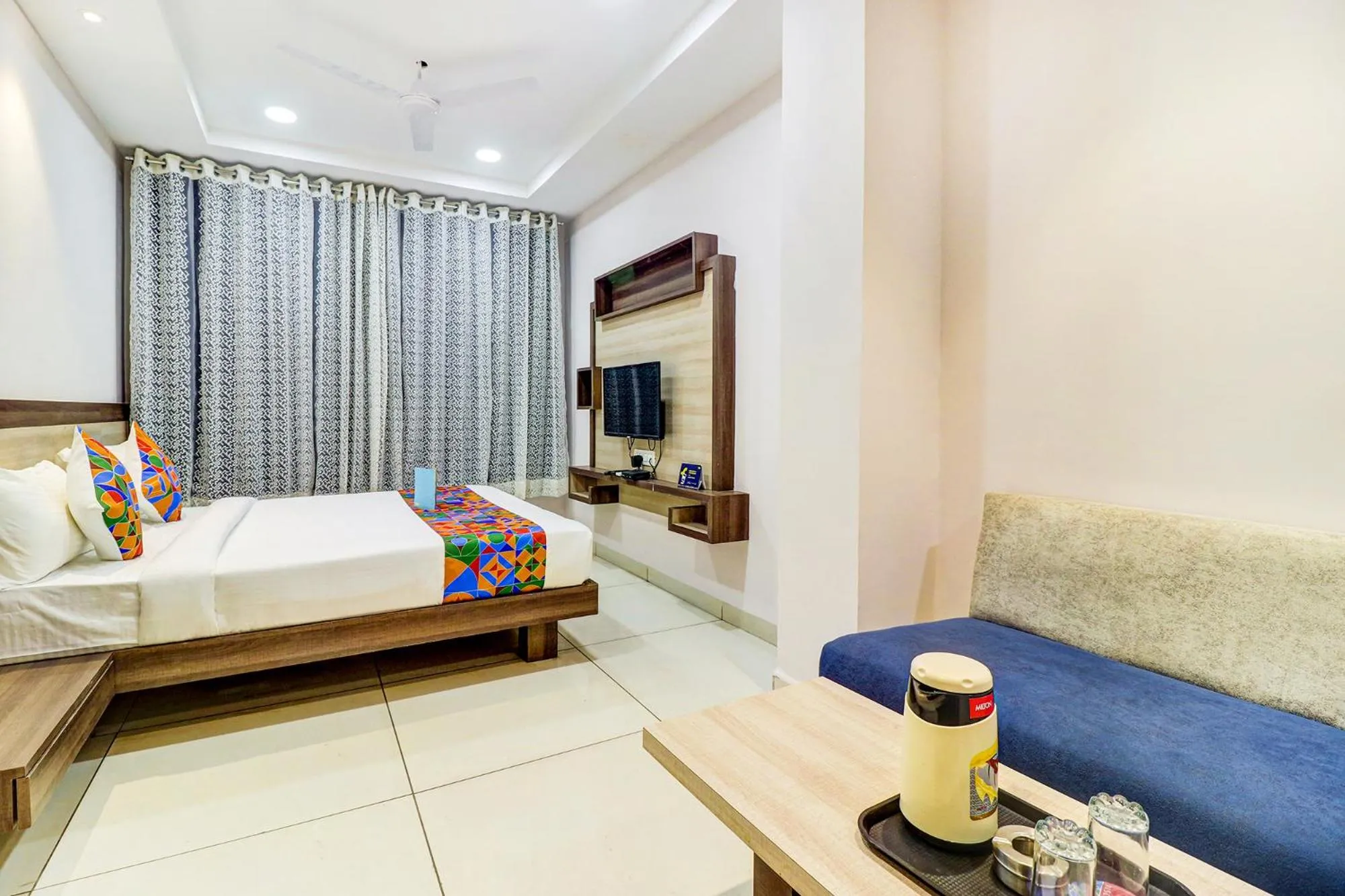 Bed in FabHotel Meera Palace