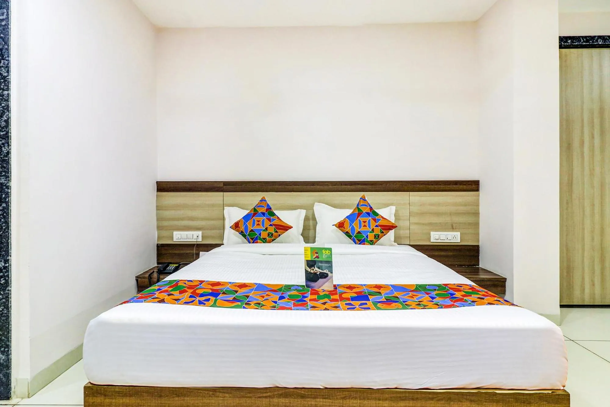 Bed in FabHotel Meera Palace