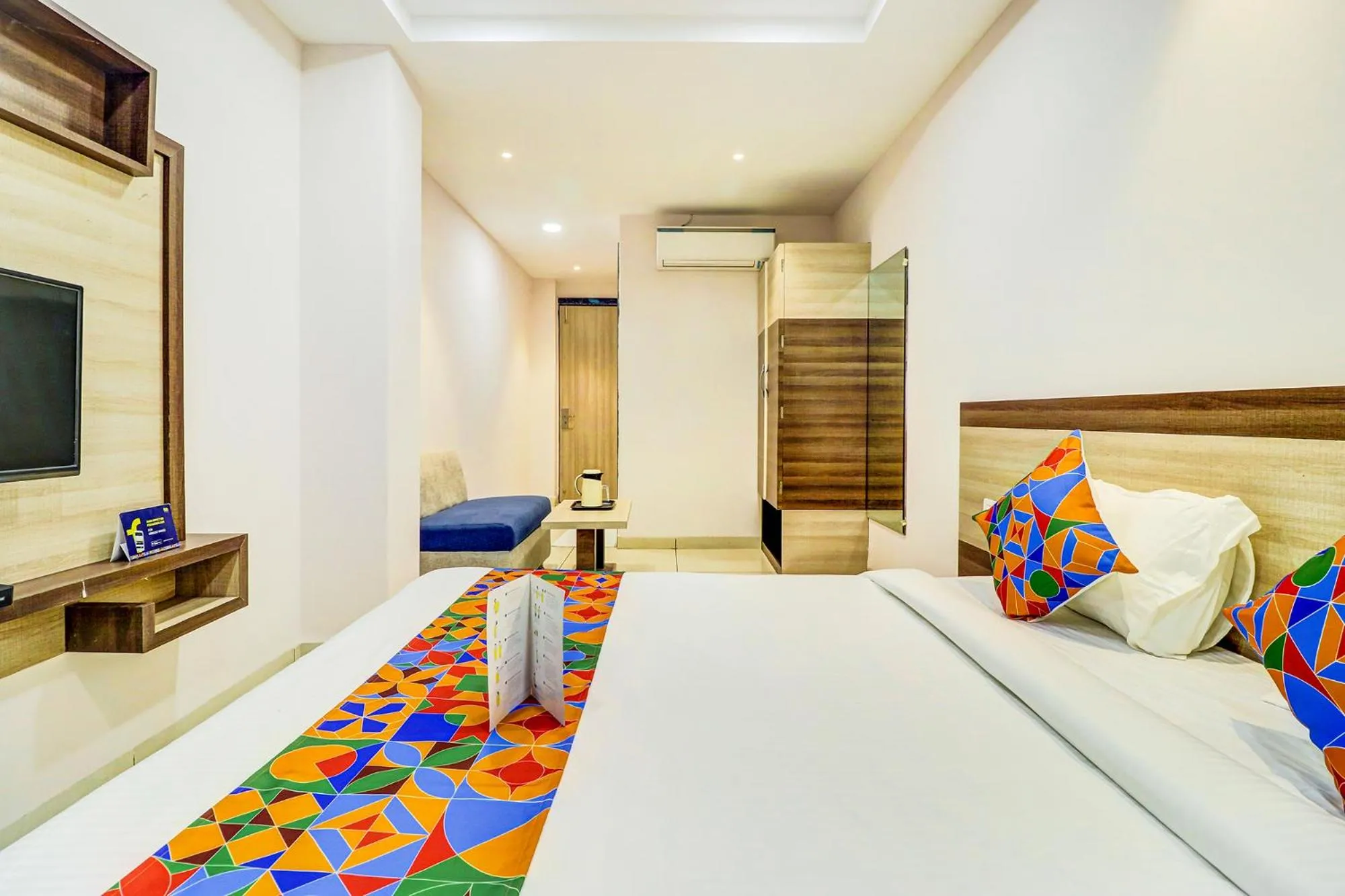 Bed in FabHotel Meera Palace