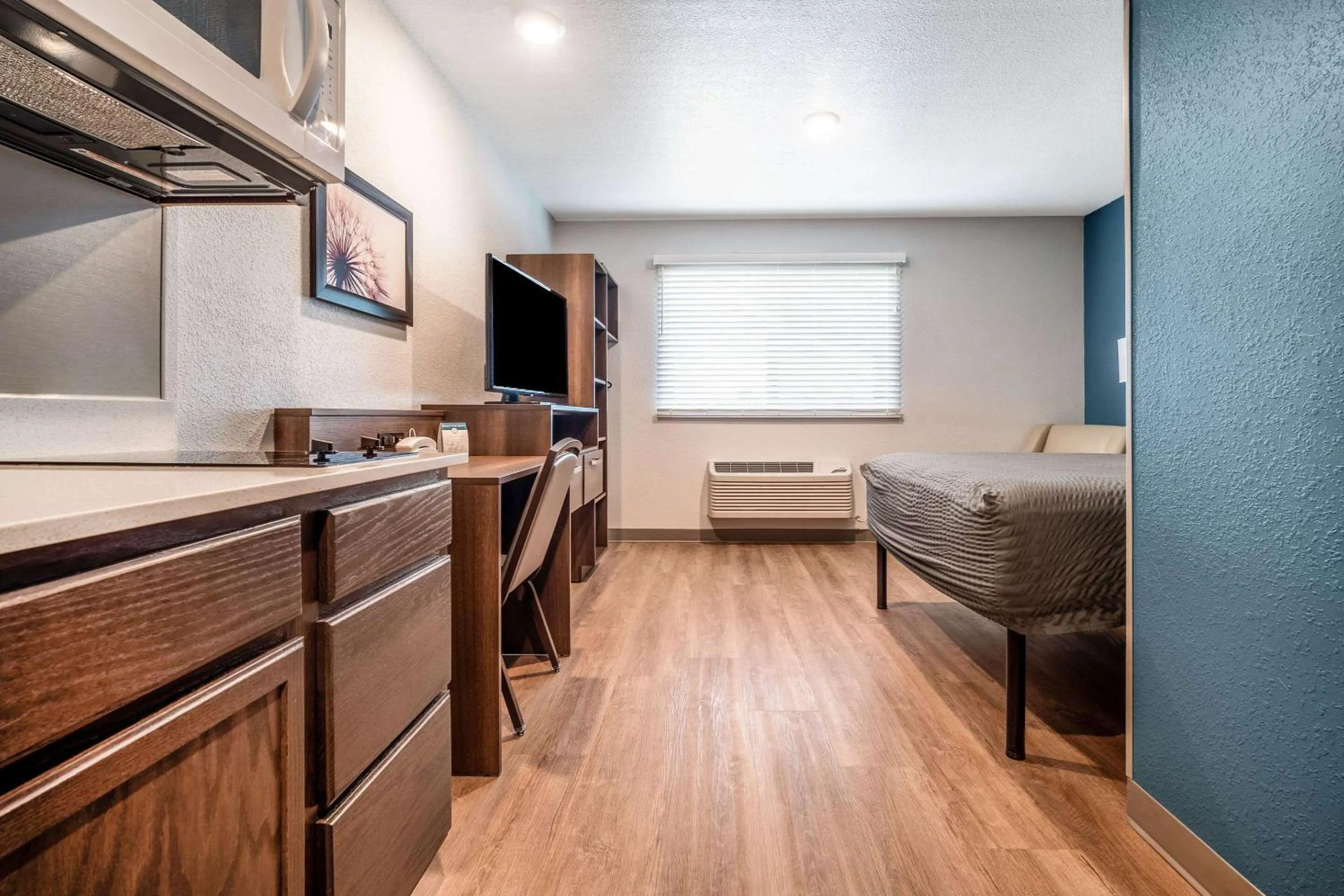 Photo of the whole room, Bed in WoodSpring Suites Naples West