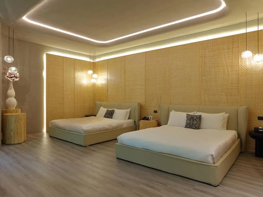 Bed in 沐蘭精品旅館-台中館 Mulan Boutique Hotel