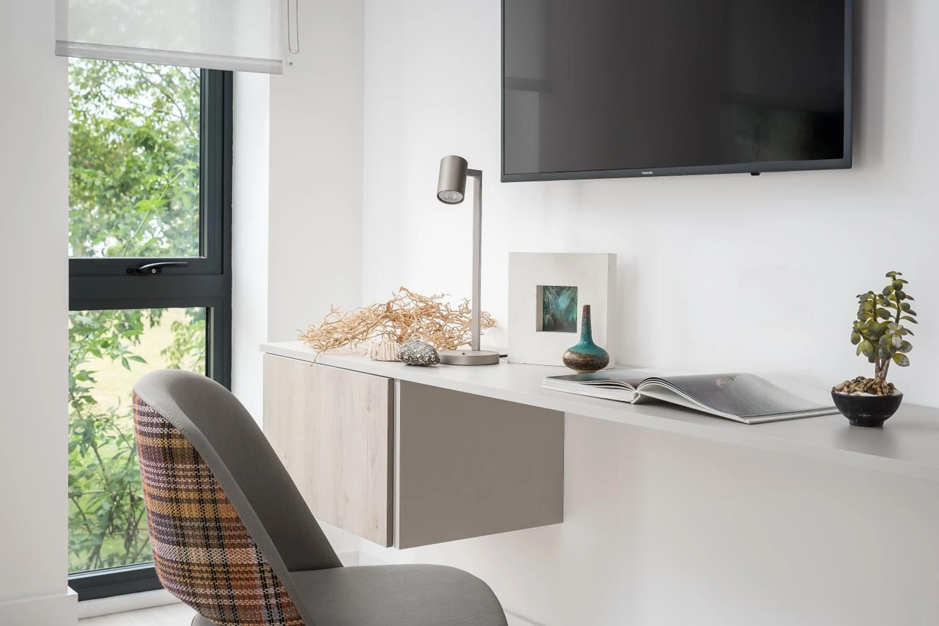 TV and multimedia in Q Square by Supercity Aparthotels