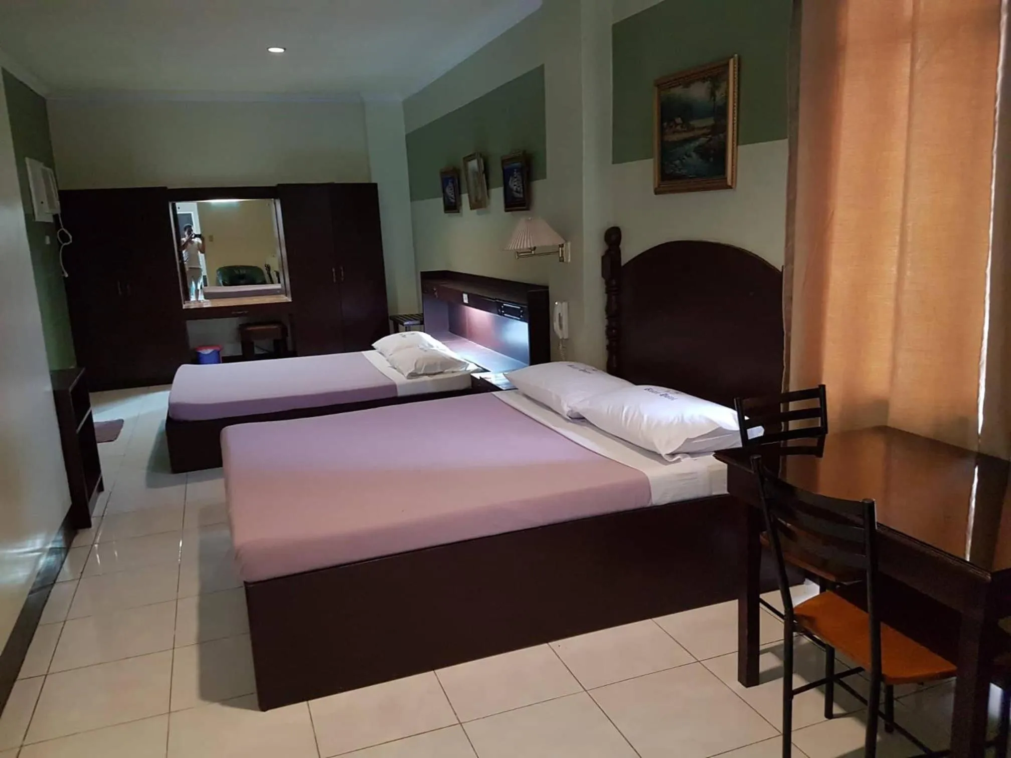 Bed in ROLET HOTEL