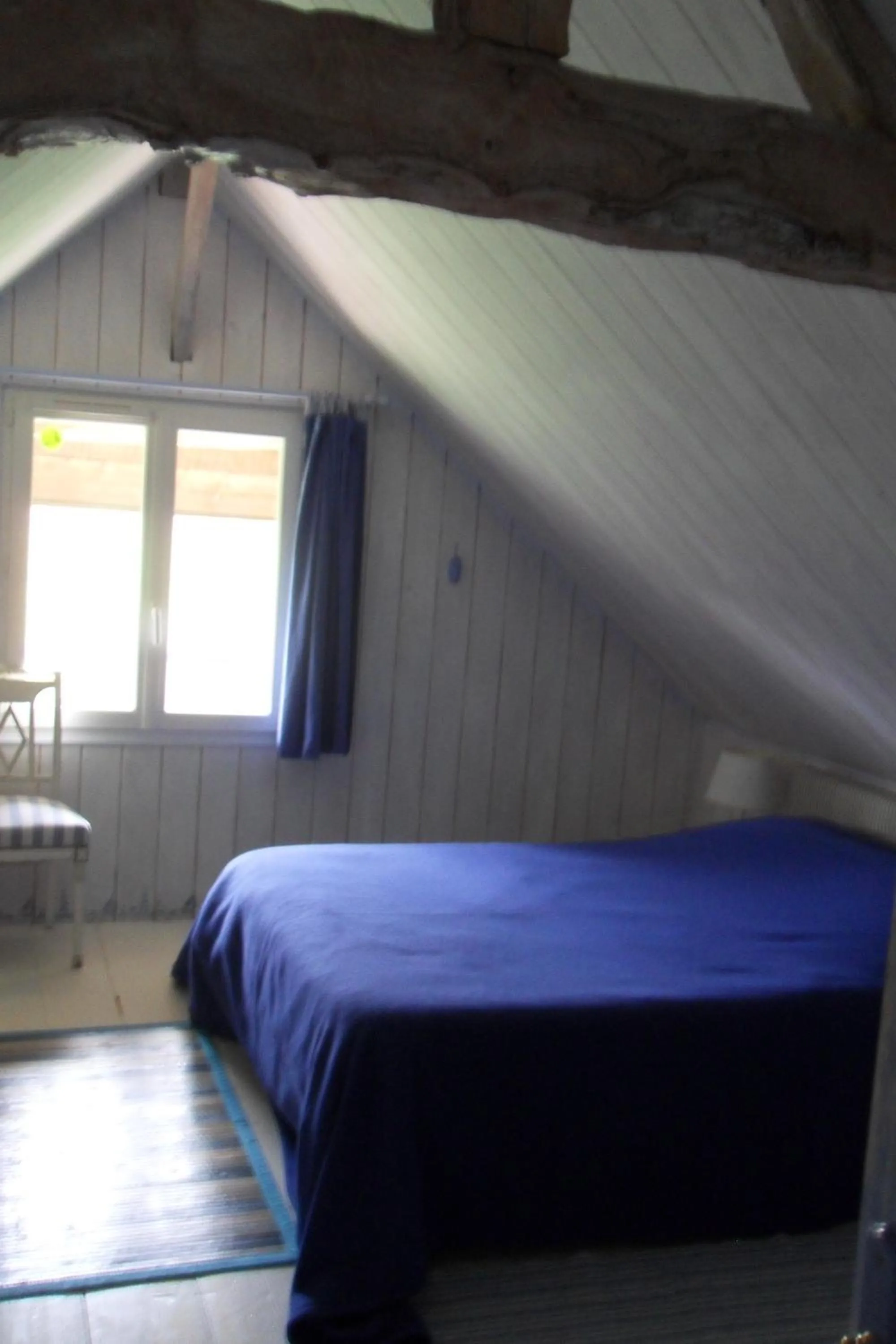Bed in Gîtes Manoir du Buquet
