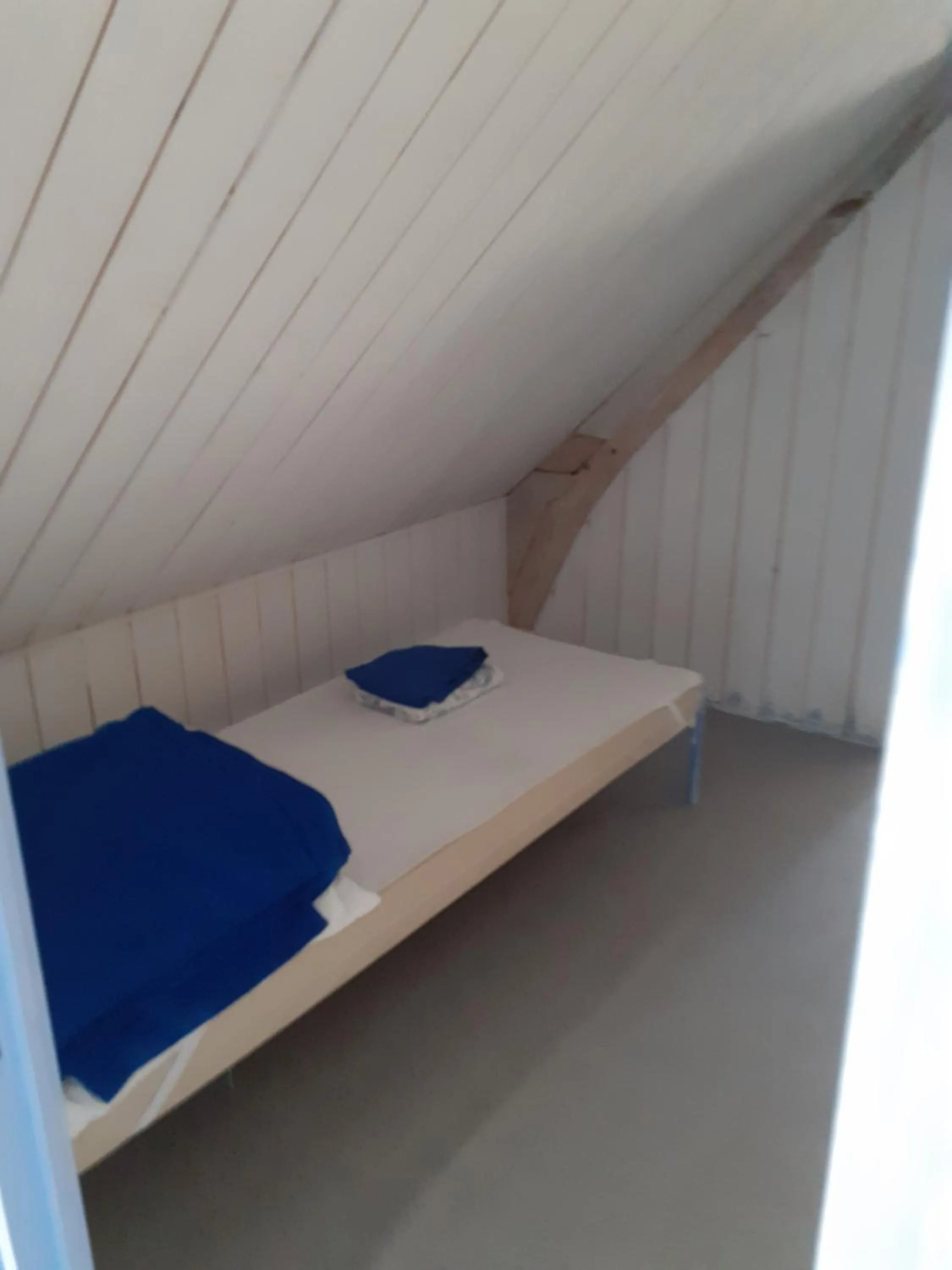 Bed in Gîtes Manoir du Buquet