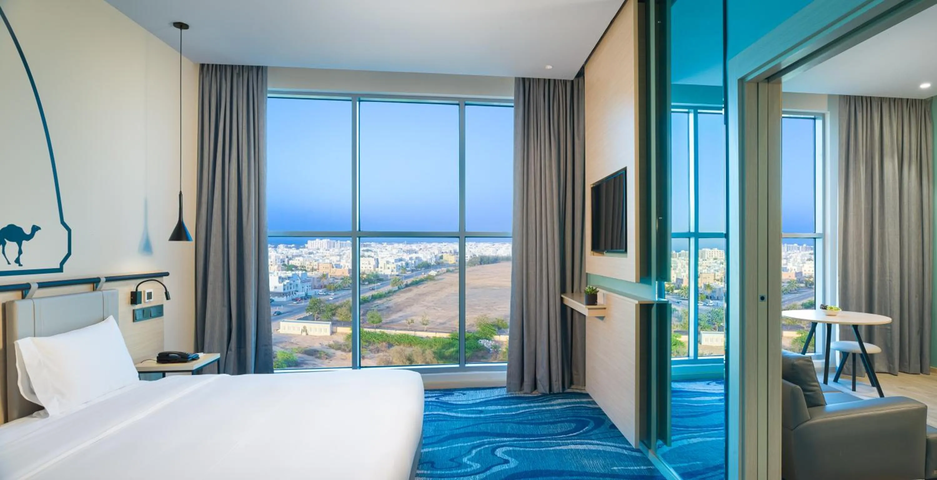 Photo of the whole room, Bed in Swiss-Belinn Airport Muscat Oman