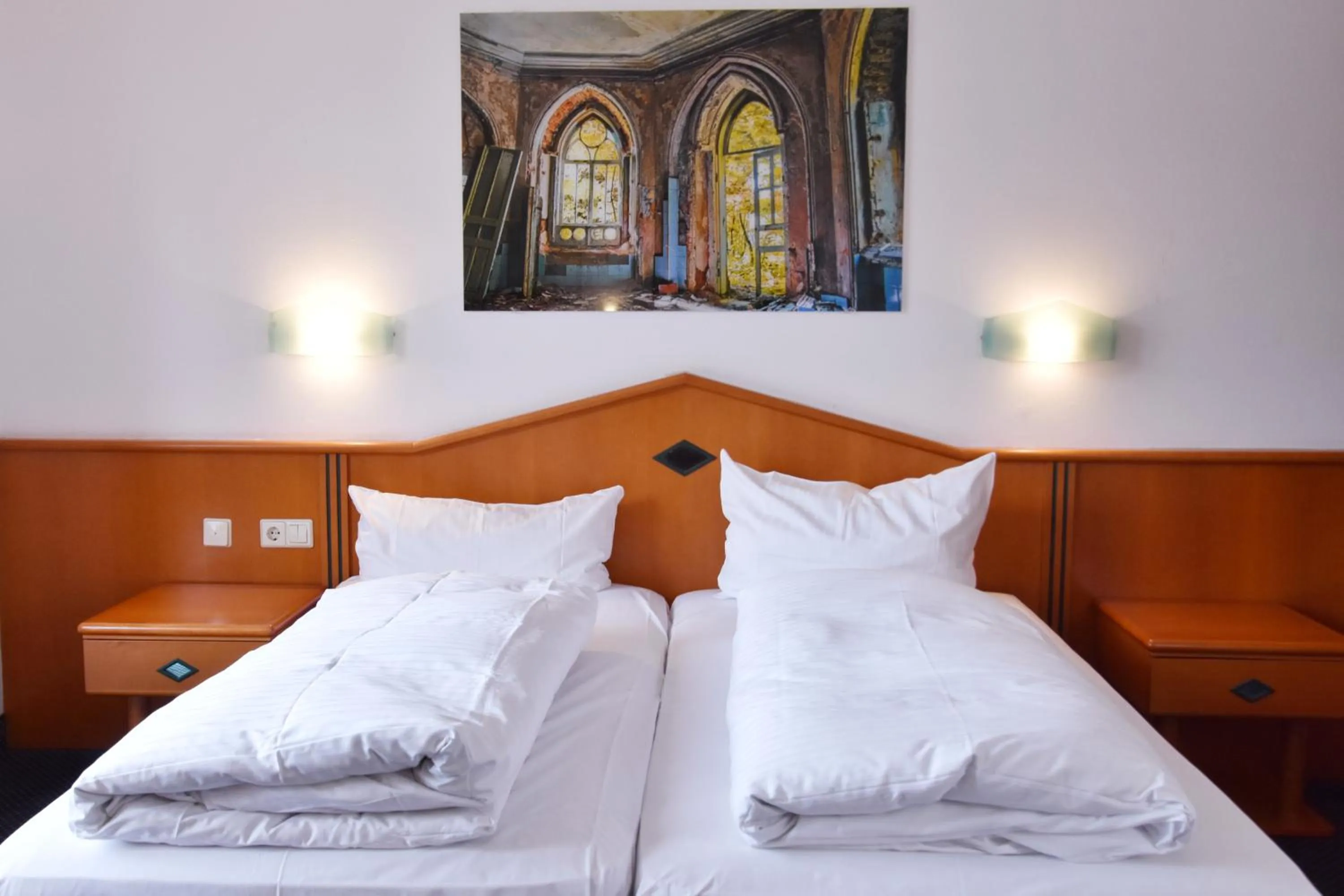 Bed in Palazzo Hotel - direkt im Zentrum