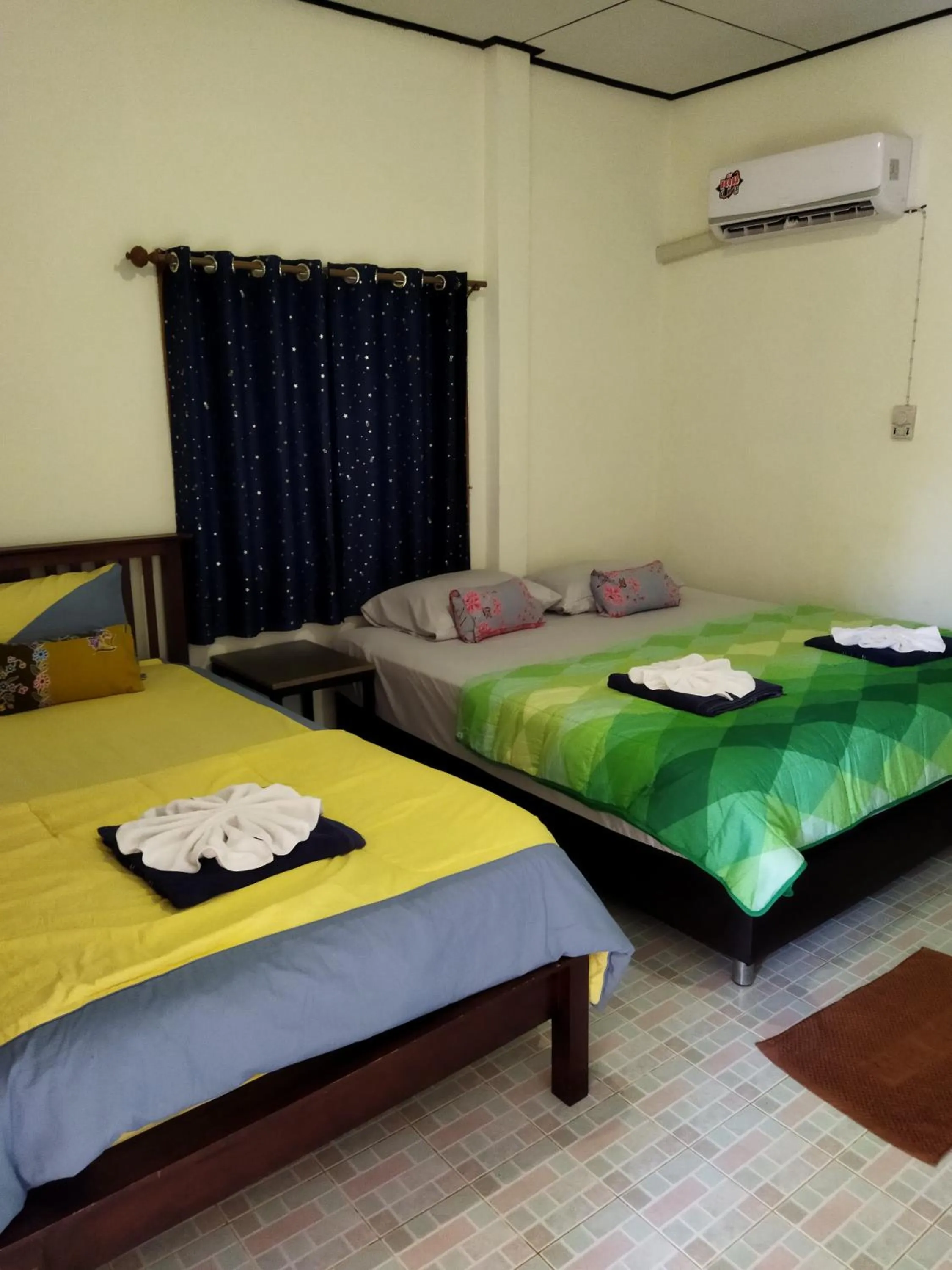 Bed in Andaman Peace Resort