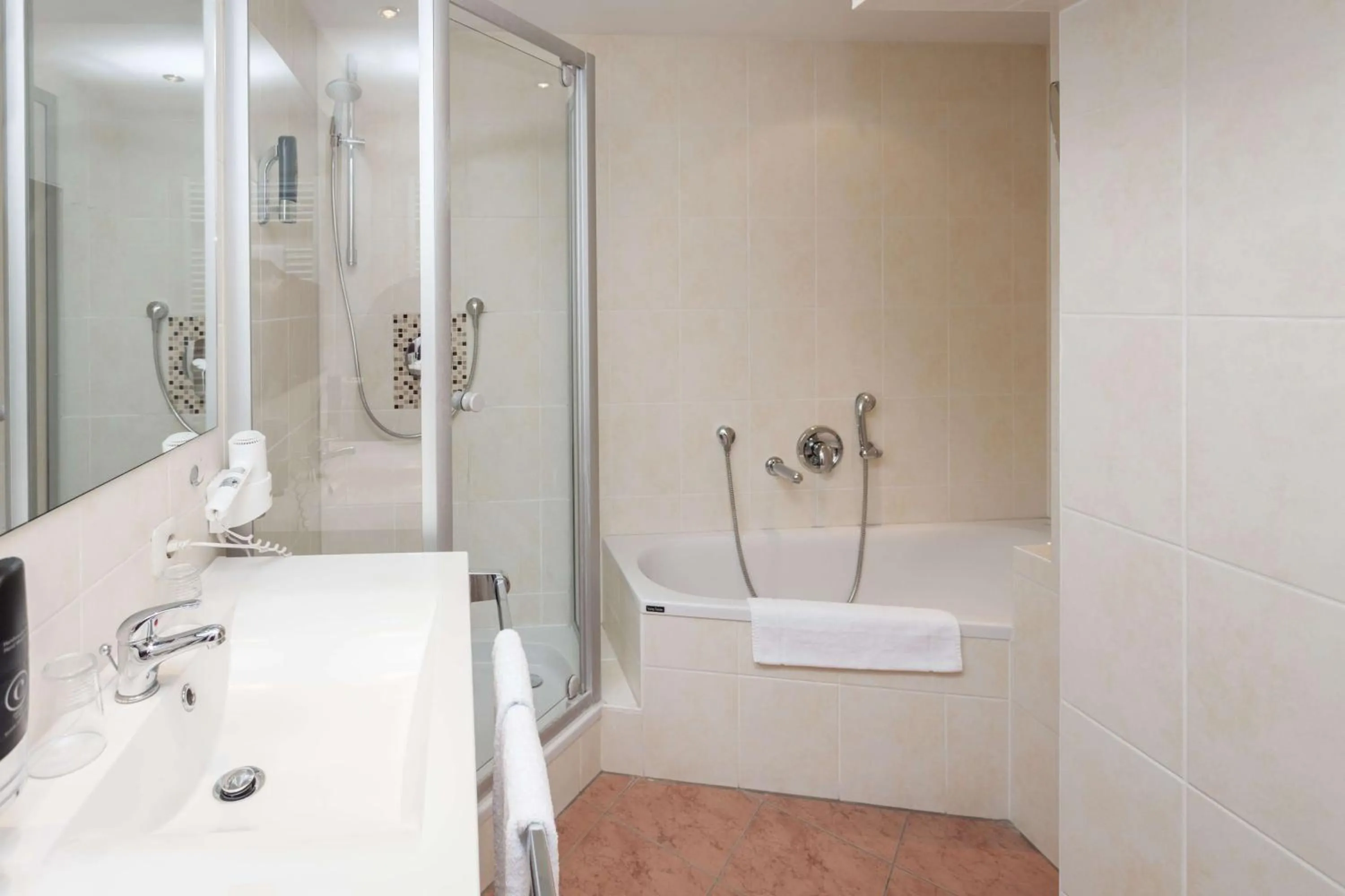 Bathroom in Centro Hotel Mondial München City, Trademark Collection by Wyndham