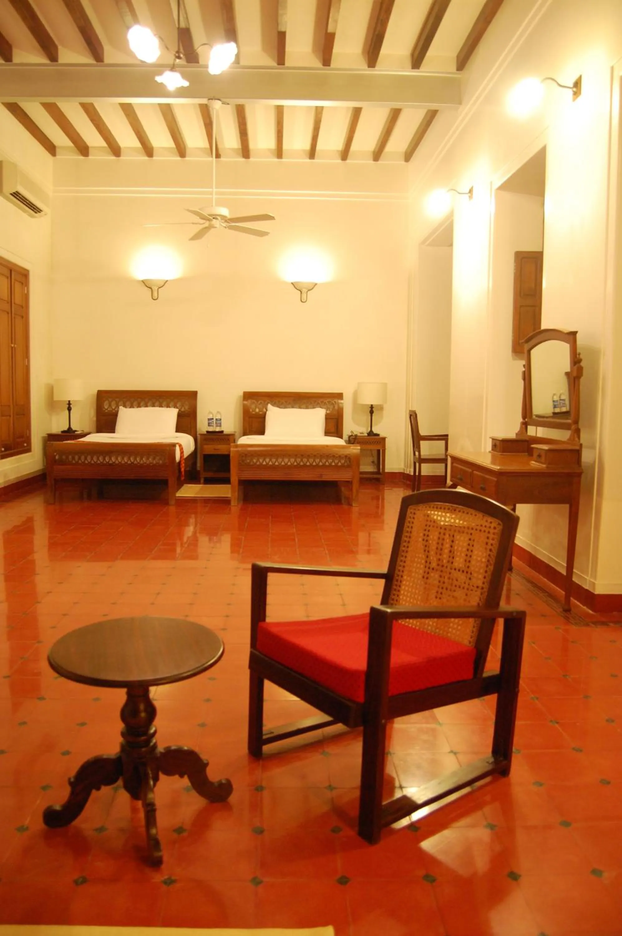 Bedroom in Visalam Chettinad Palace - A CGH Earth Experience