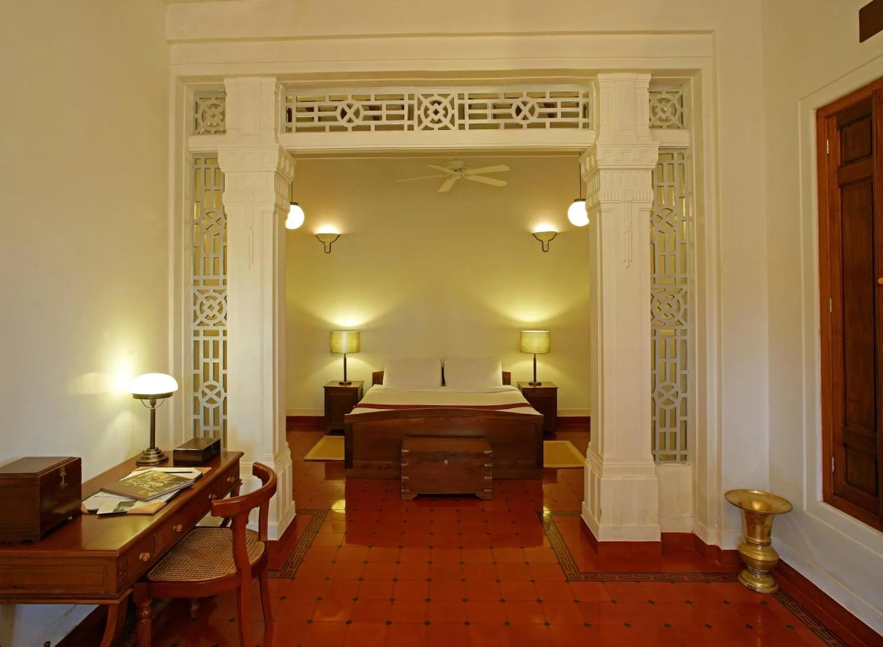 Bed in Visalam Chettinad Palace - A CGH Earth Experience