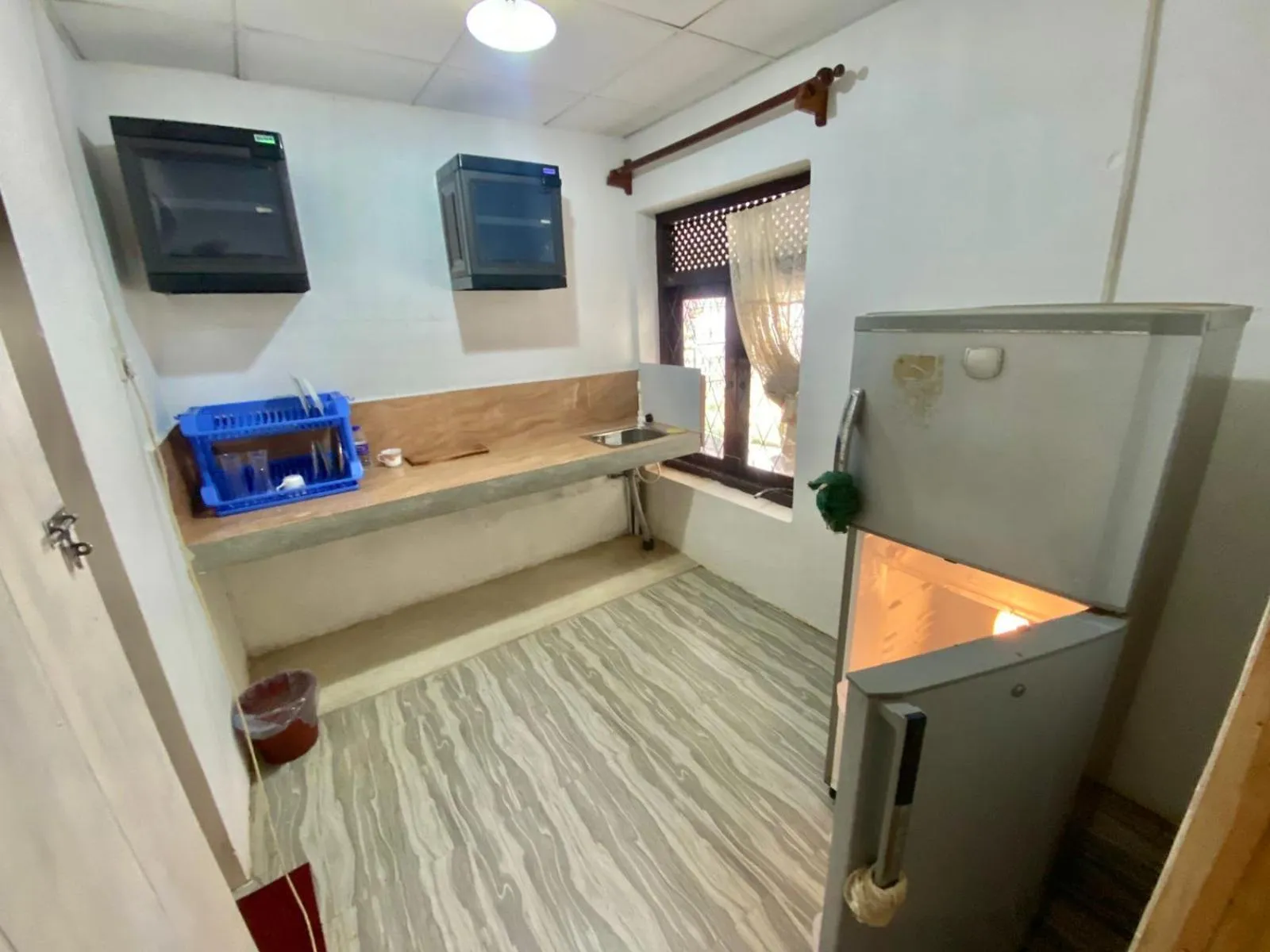 Kitchen or kitchenette in Hiriketiya Orchid Villa