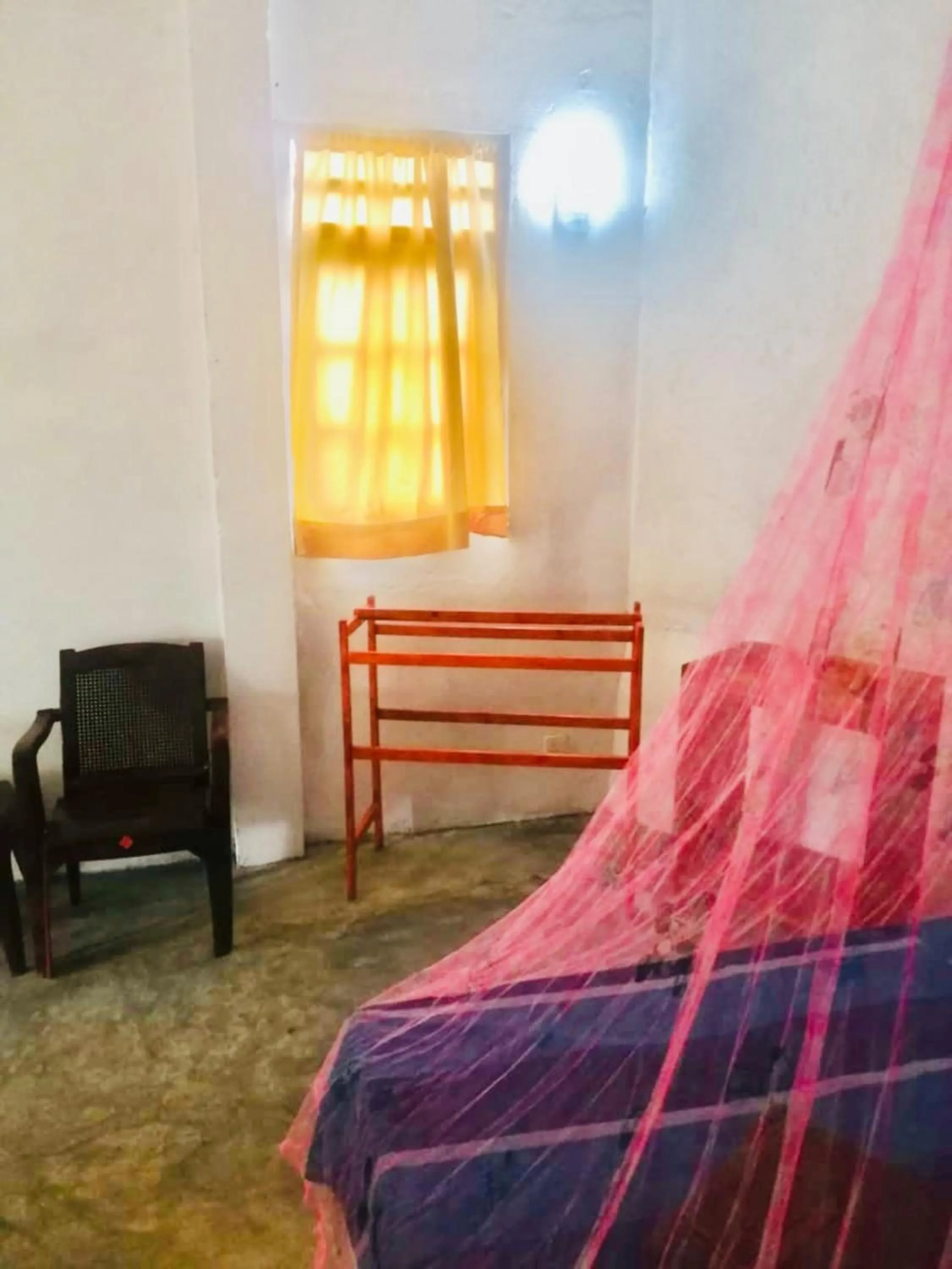 Bed in Hiriketiya Orchid Villa