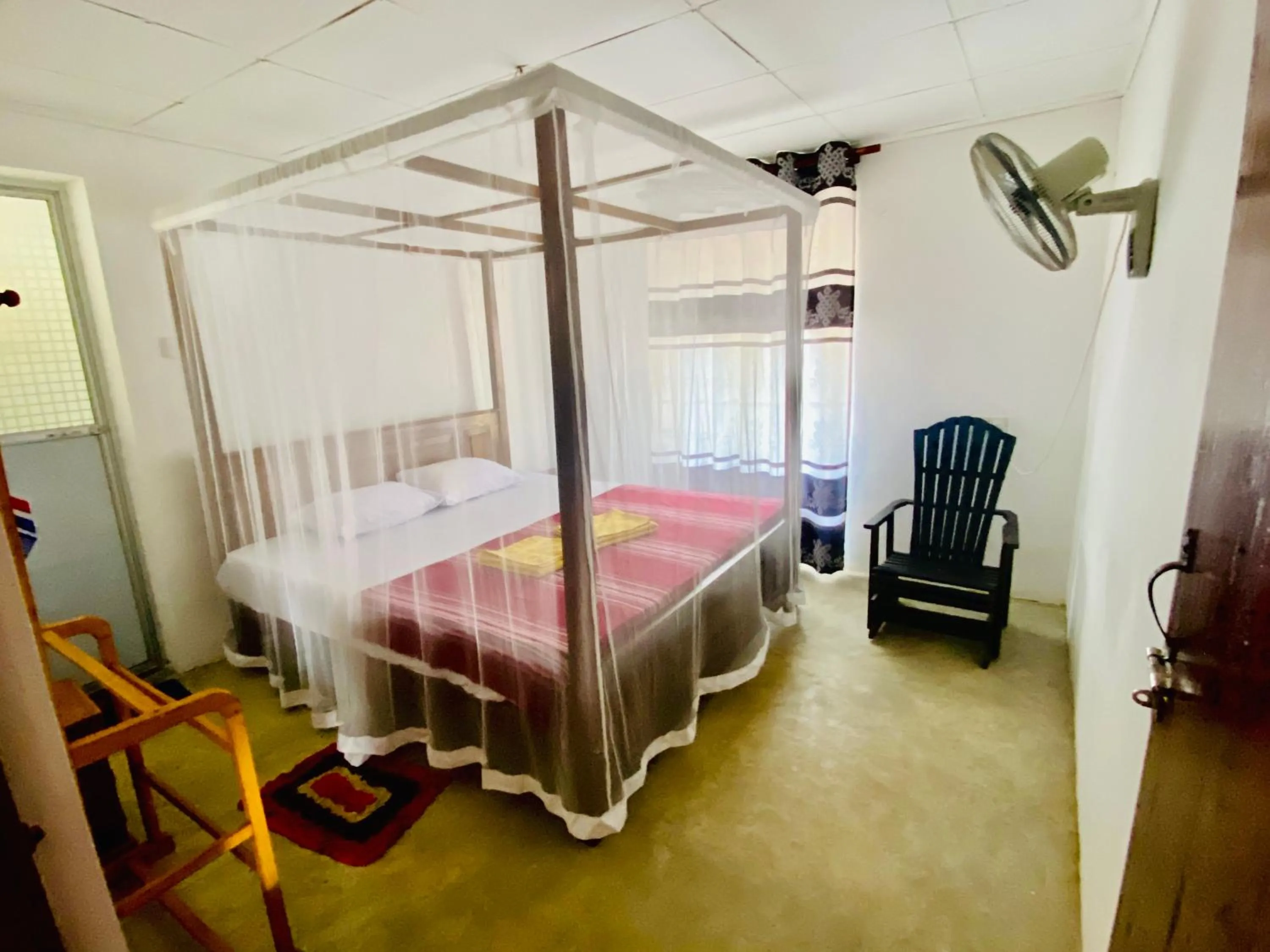 Bed in Hiriketiya Orchid Villa