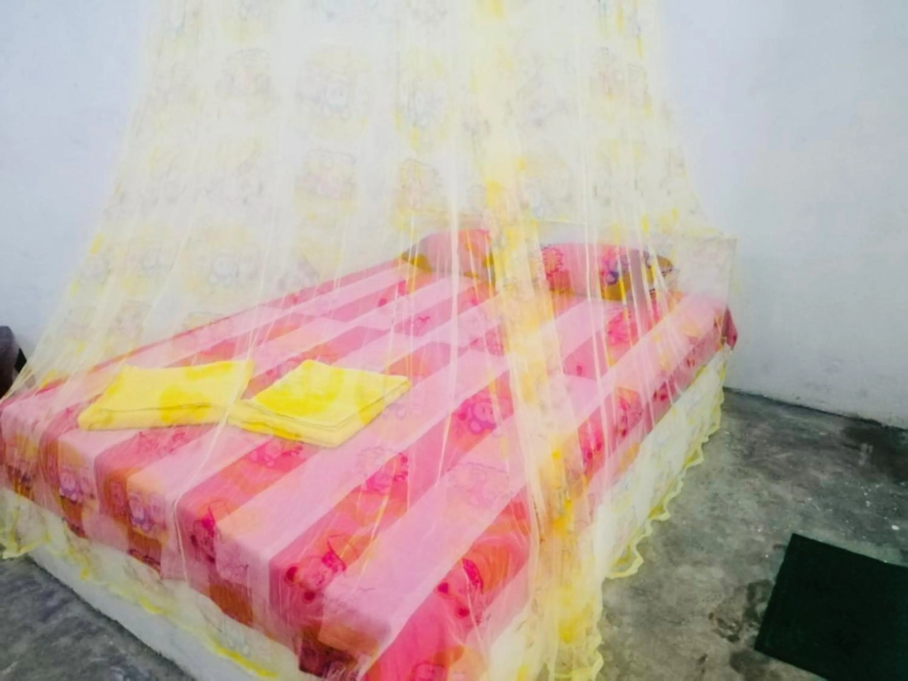 Bed in Hiriketiya Orchid Villa