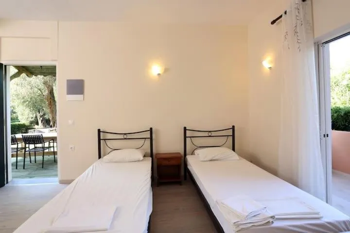 Bedroom in Villa Rosa Apartments