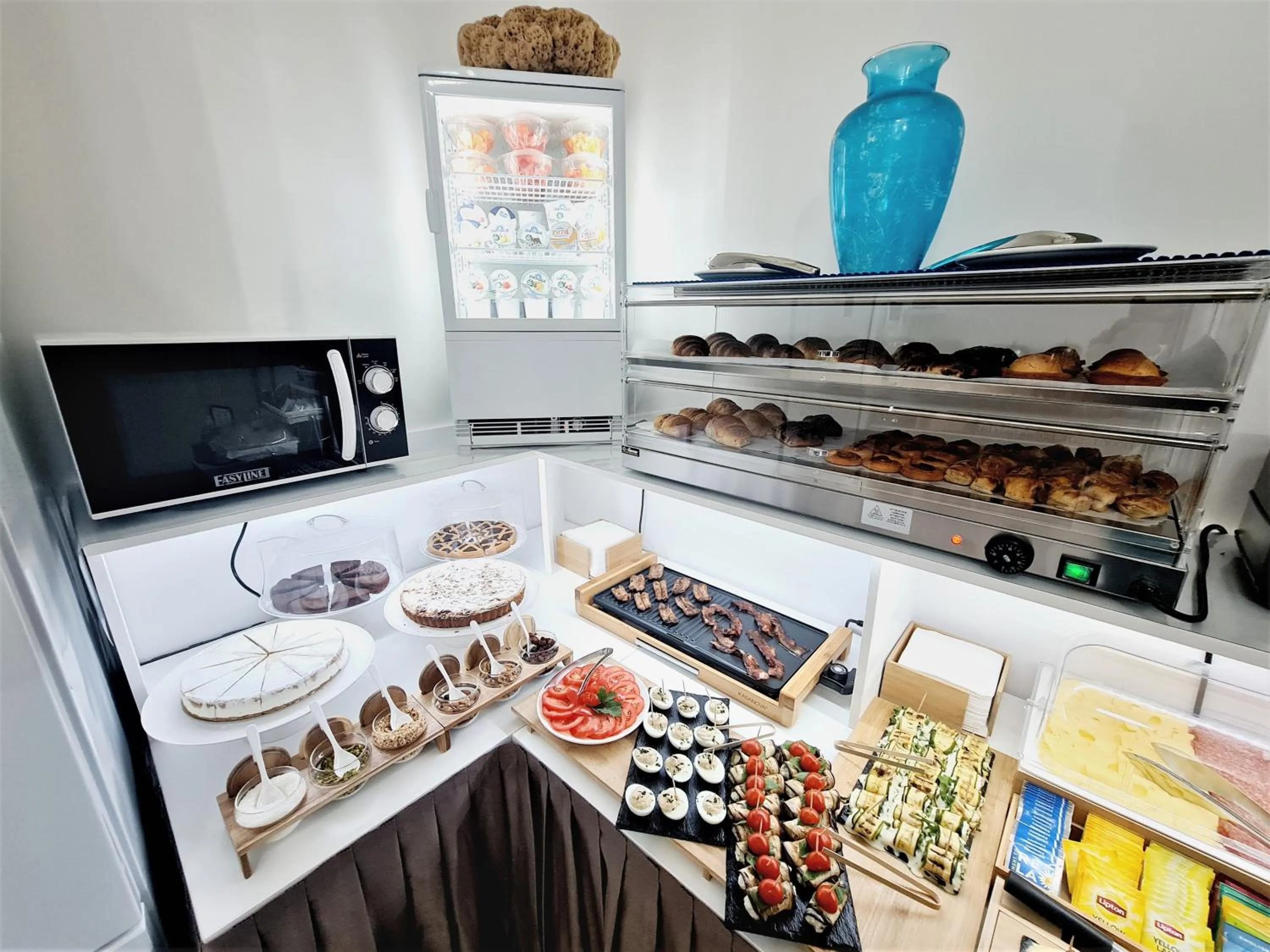 Breakfast in Kalinifta Rooms Apartment