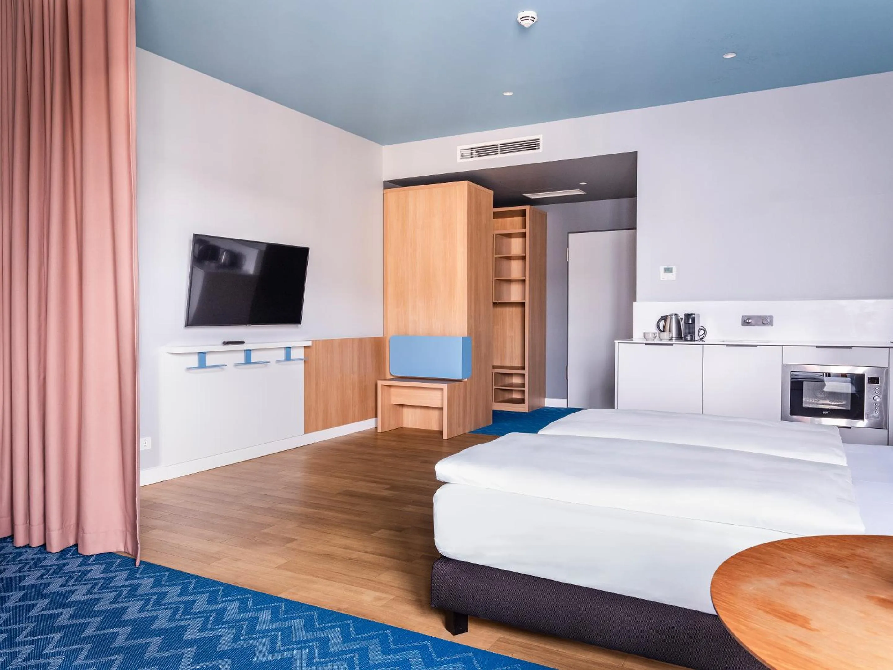 Bed in about:berlin Hotel