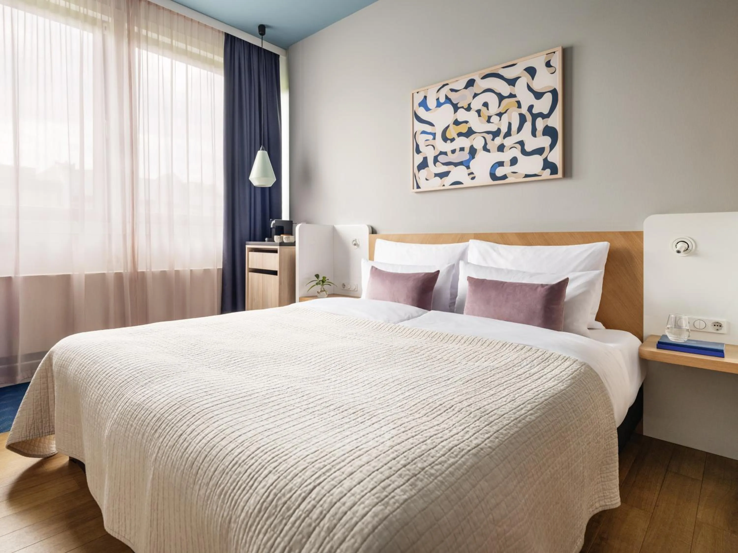 Bed in Numa Berlin Kudamm