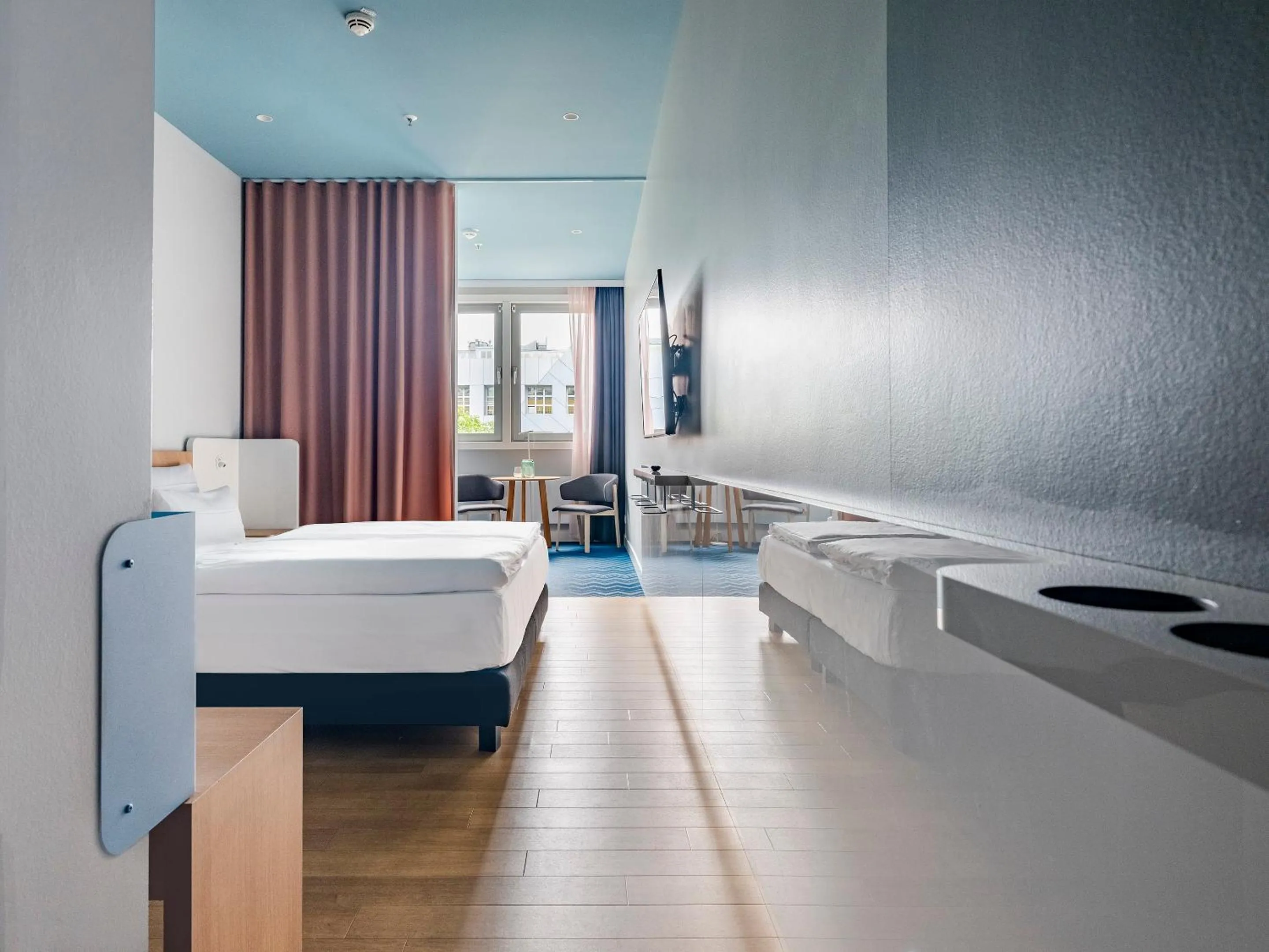 Bed in about:berlin Hotel