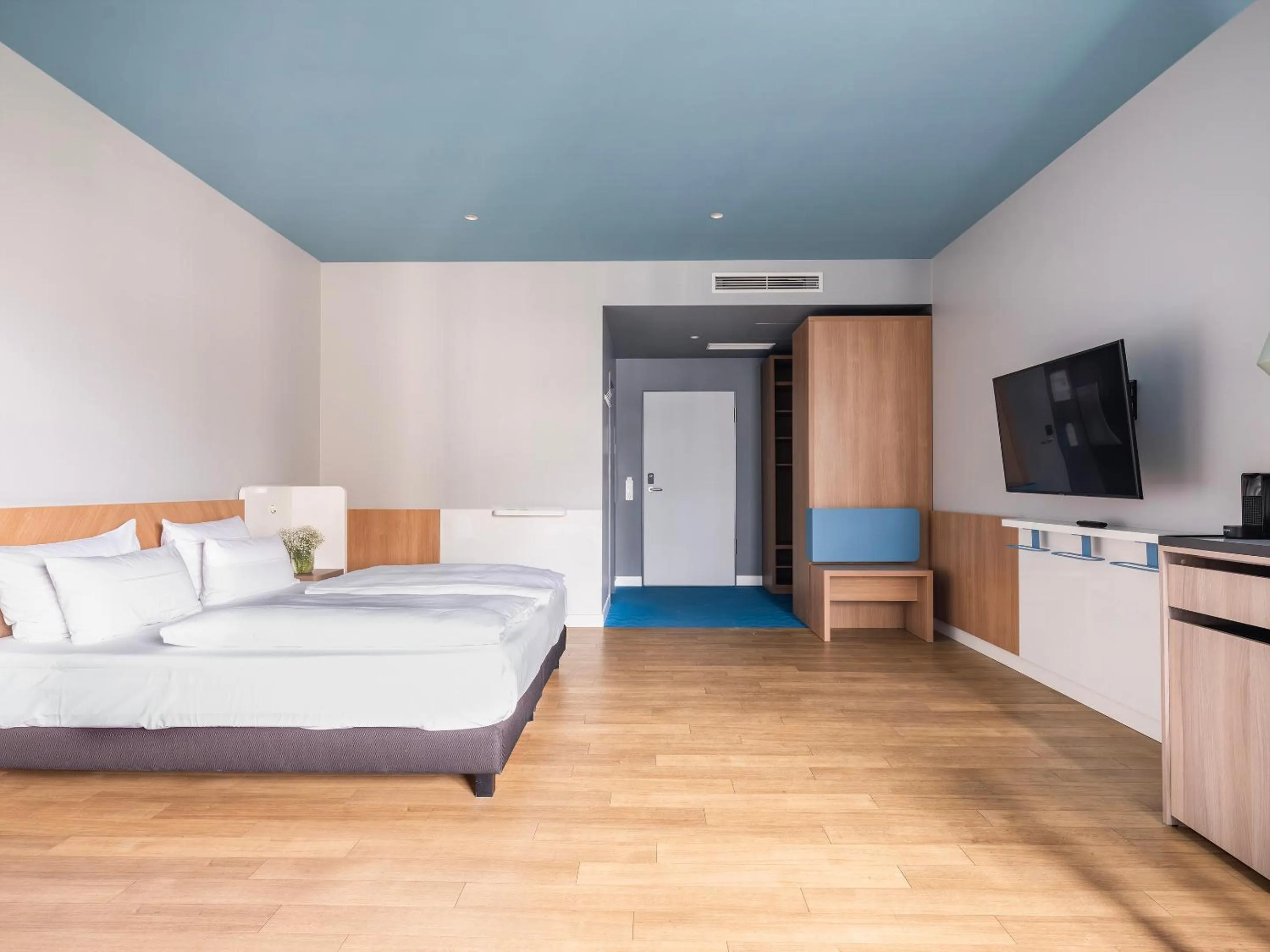 Bed in about:berlin Hotel