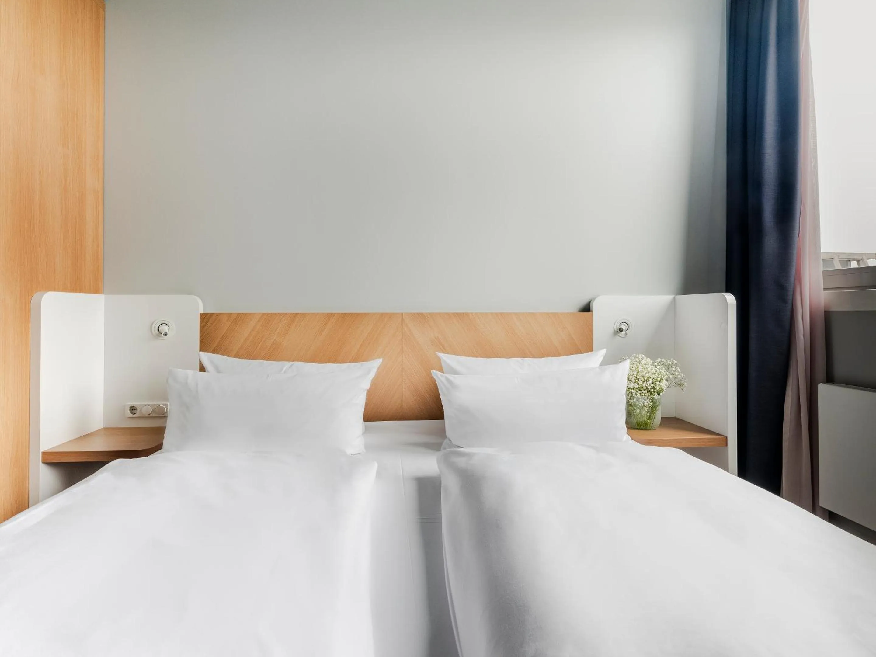 Bed in about:berlin Hotel