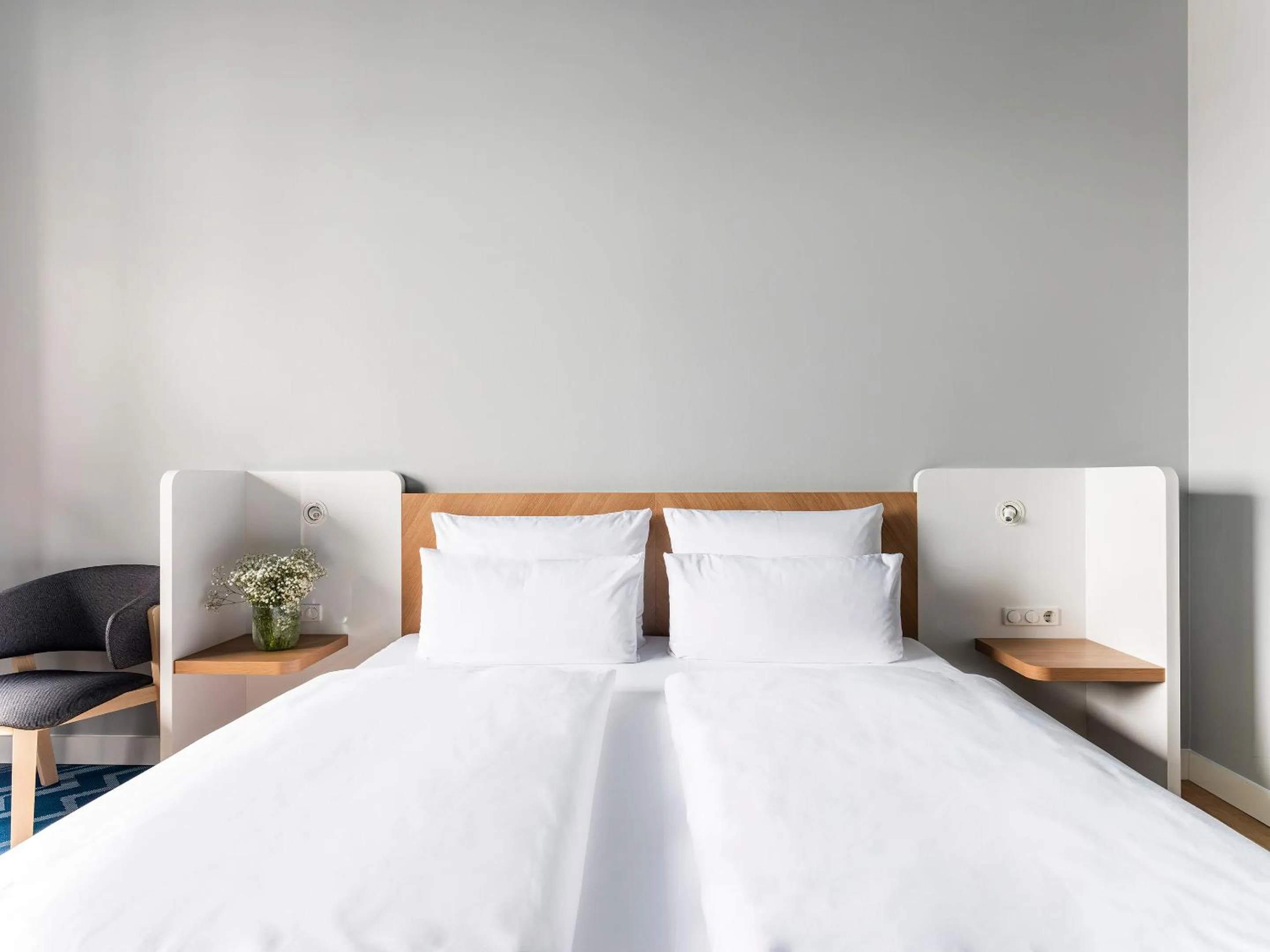 Bed in about:berlin Hotel