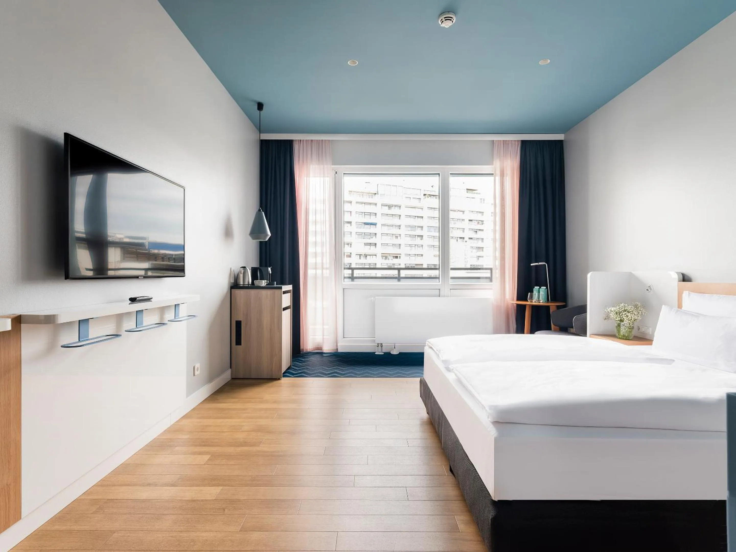 Bed in about:berlin Hotel