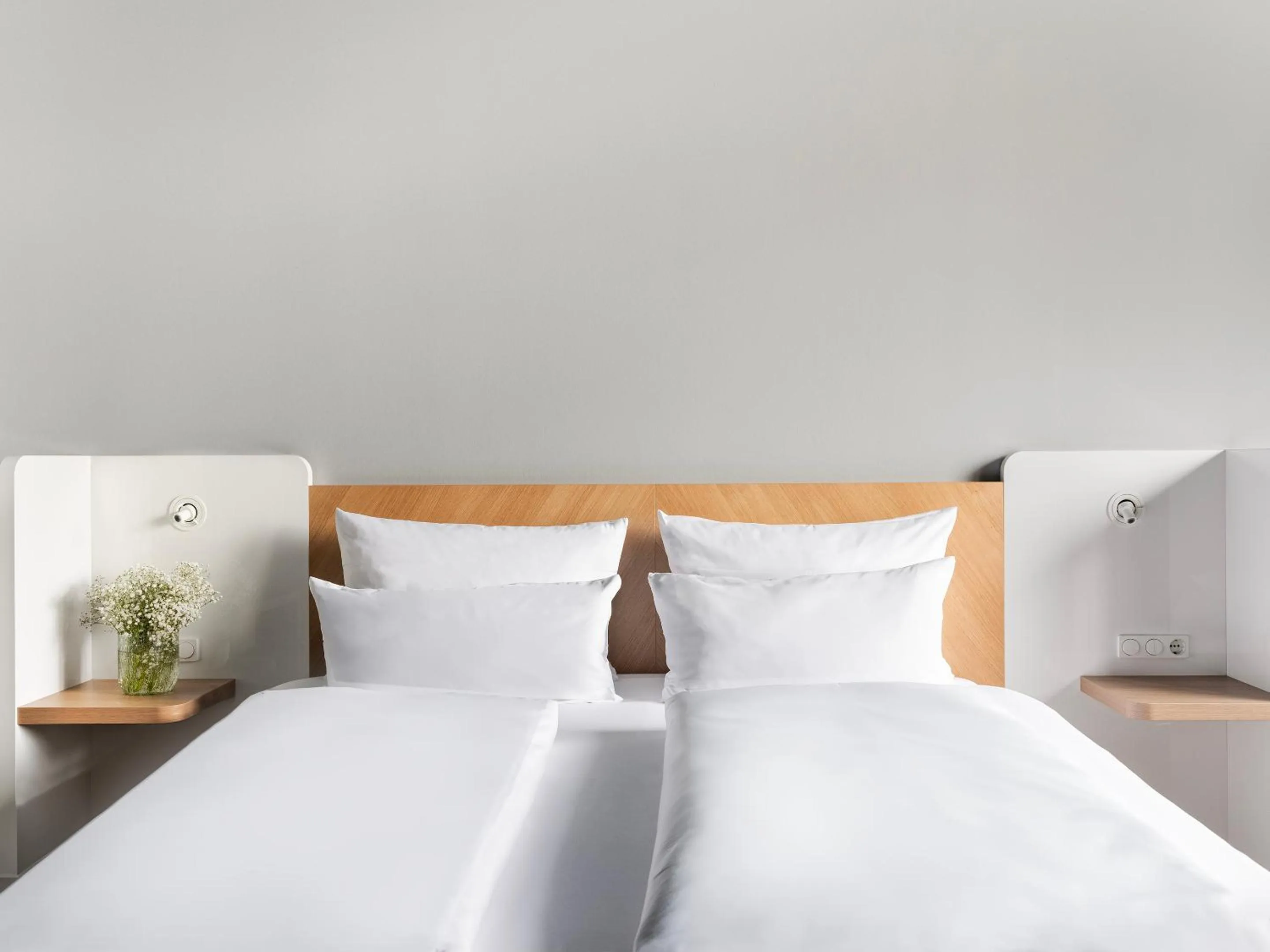 Bed in about:berlin Hotel