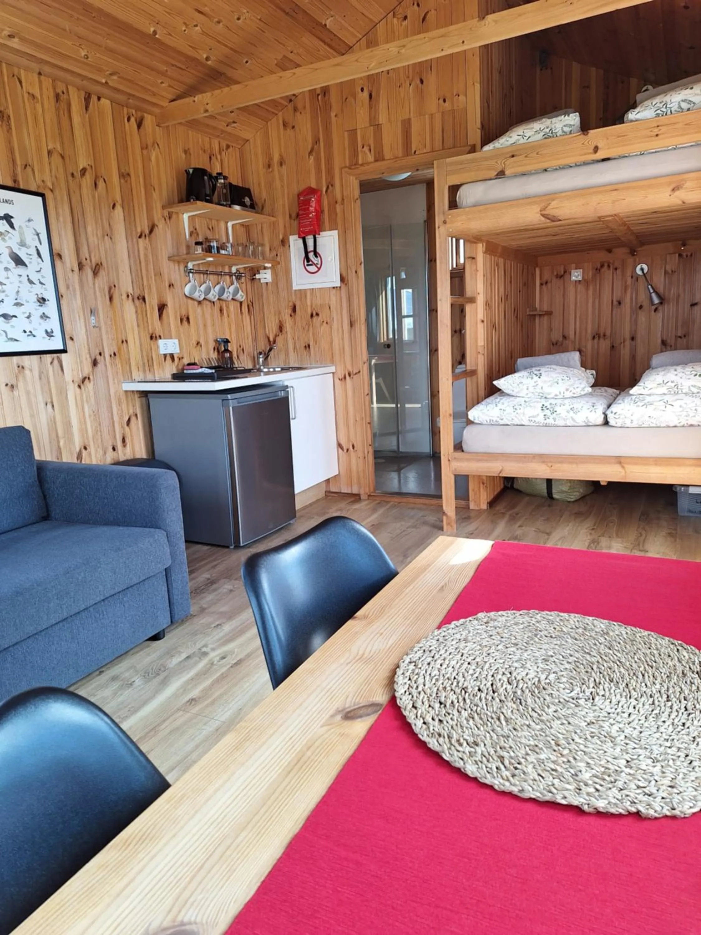 Kitchen or kitchenette, Bed in Lambhus Glacier View Cabins