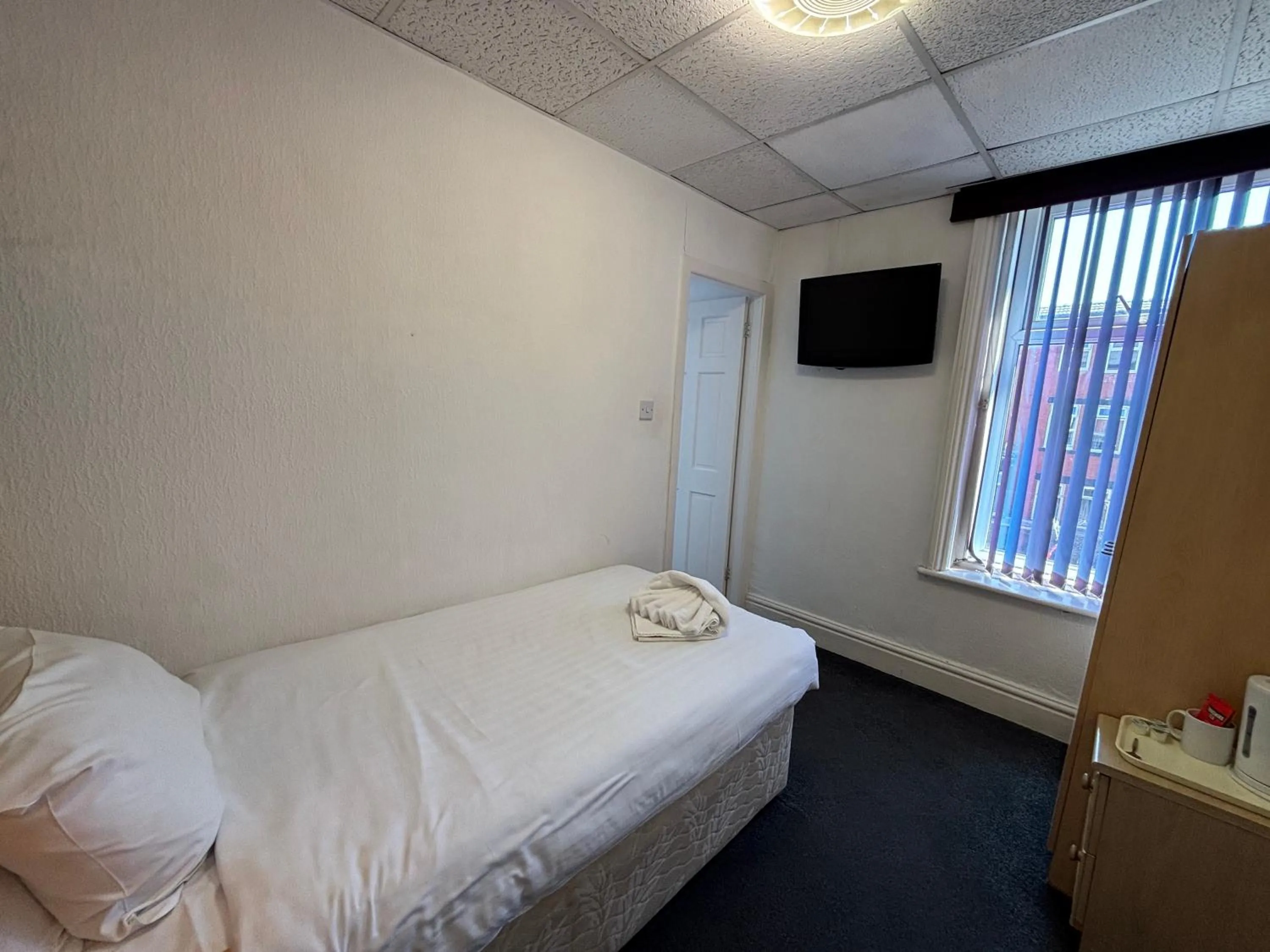 Bed in The Royal Alexandra Hotel by Compass Hospitality