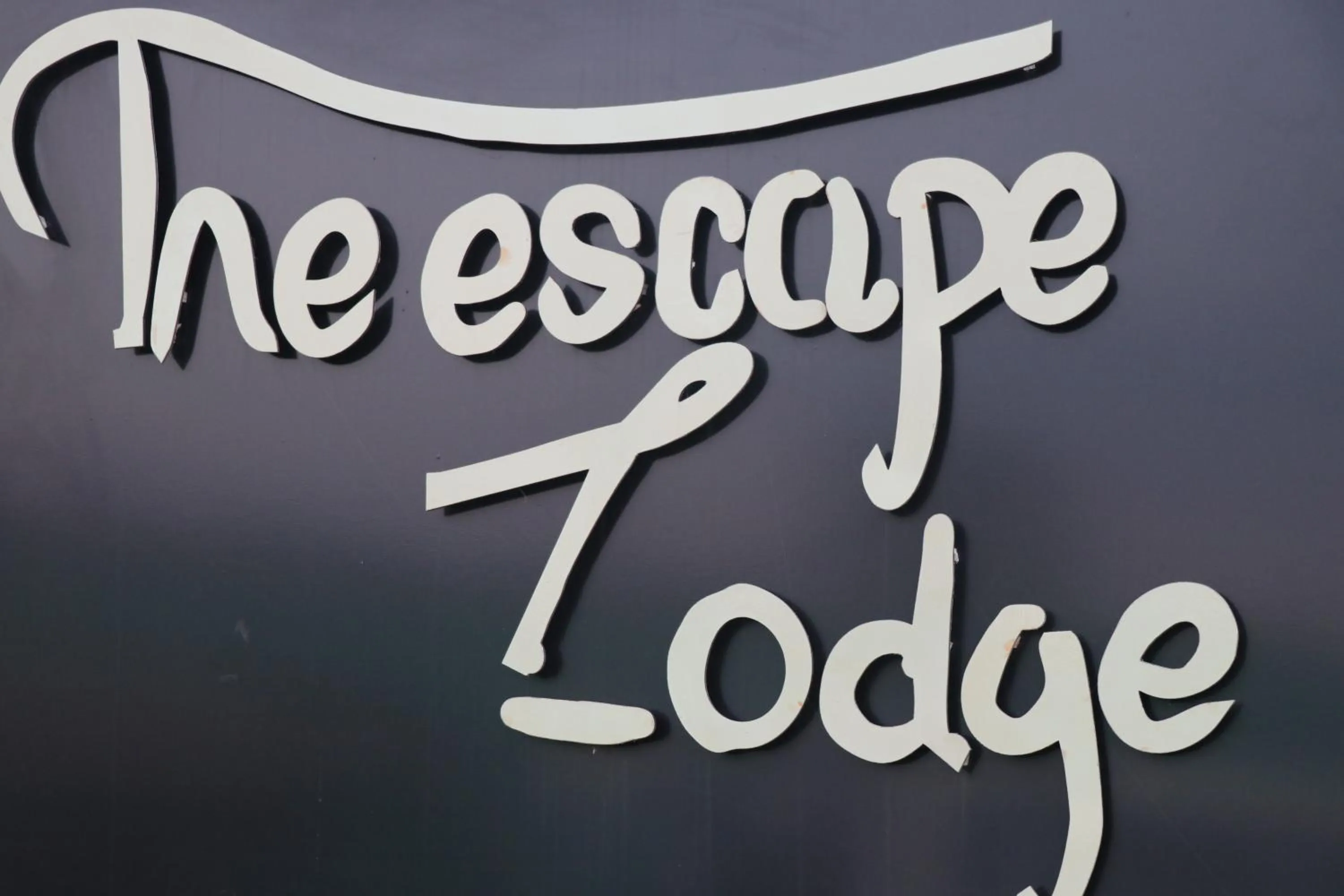 Property logo or sign in THE ESCAPE LODGE