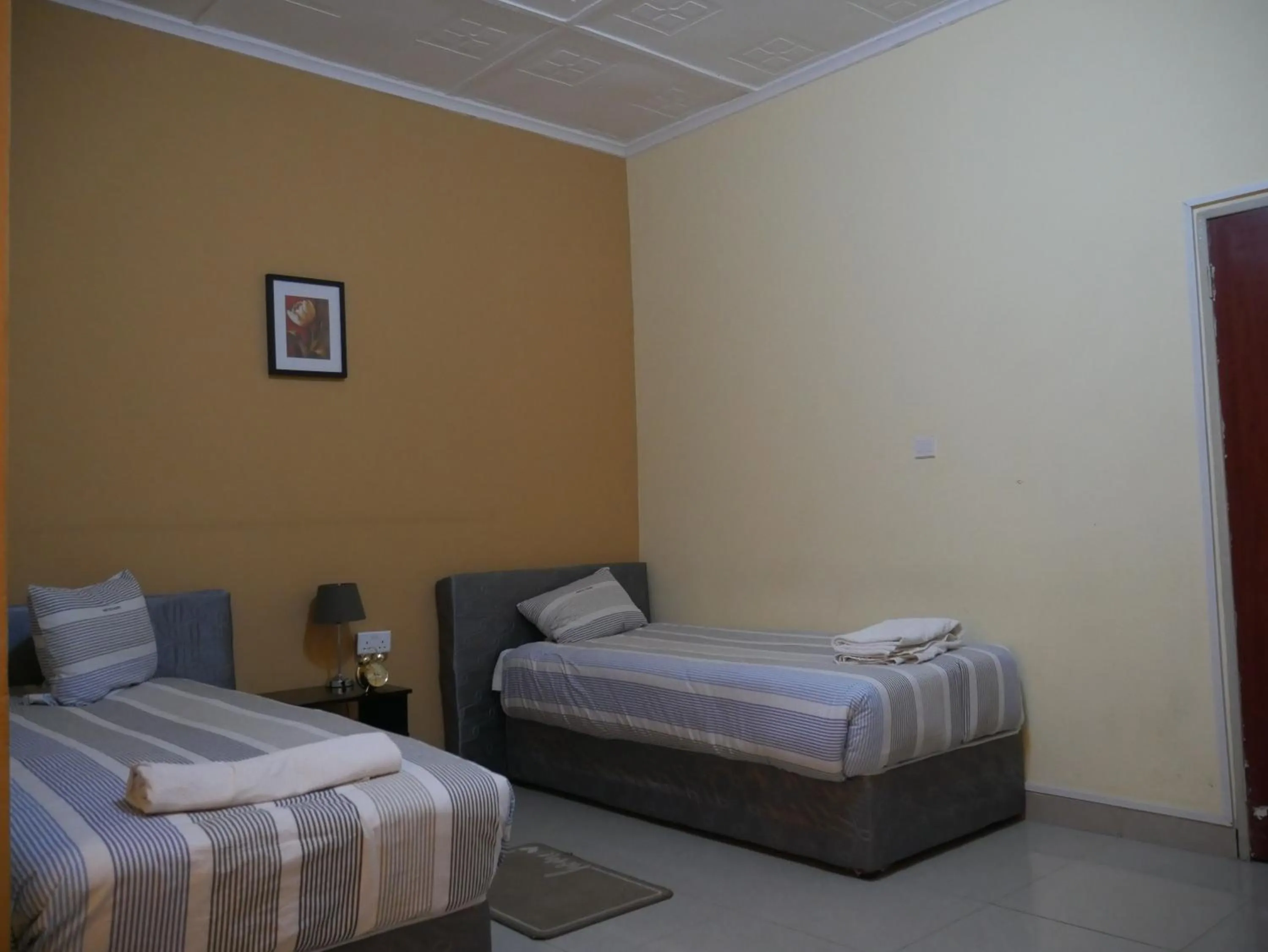 Bed in THE ESCAPE LODGE