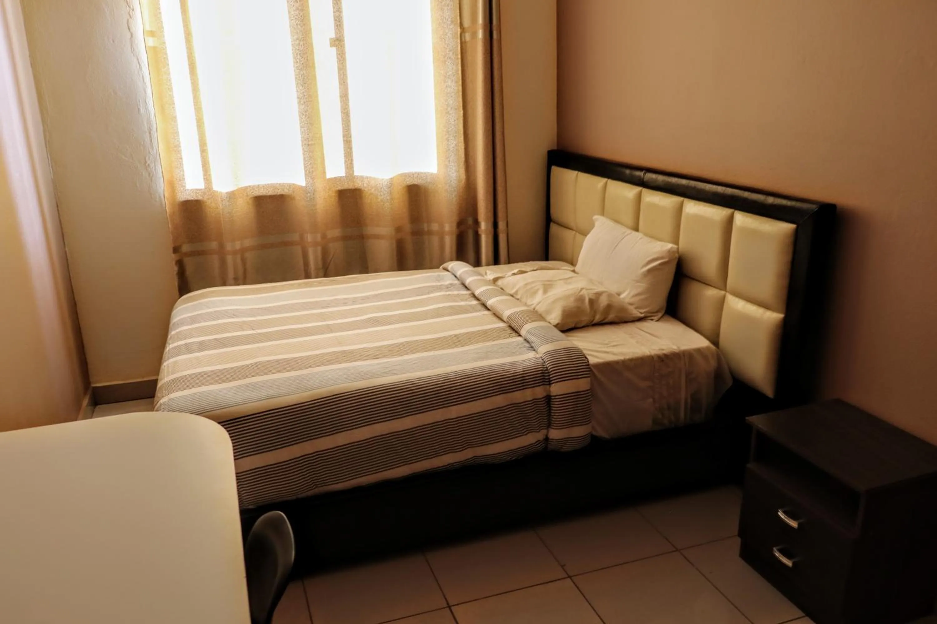 Bed in THE ESCAPE LODGE