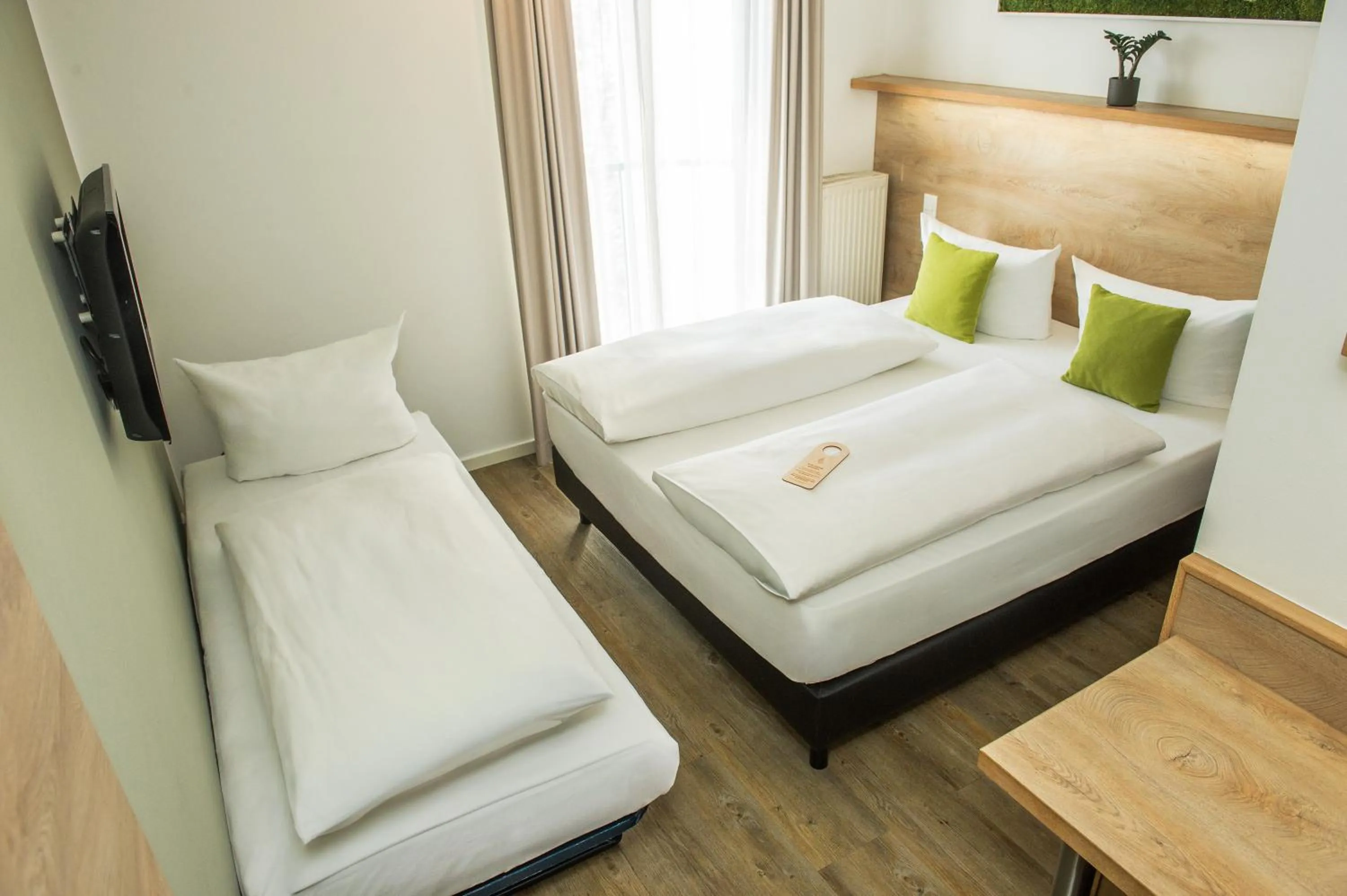 older children, Bed in Hotel Perlach Allee by Blattl