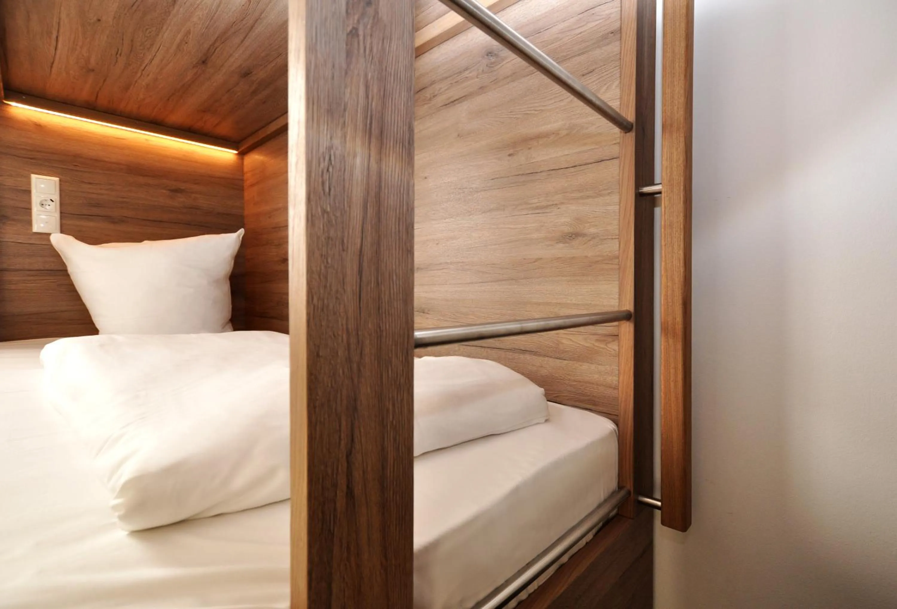 Decorative detail, Bed in Hotel Perlach Allee by Blattl