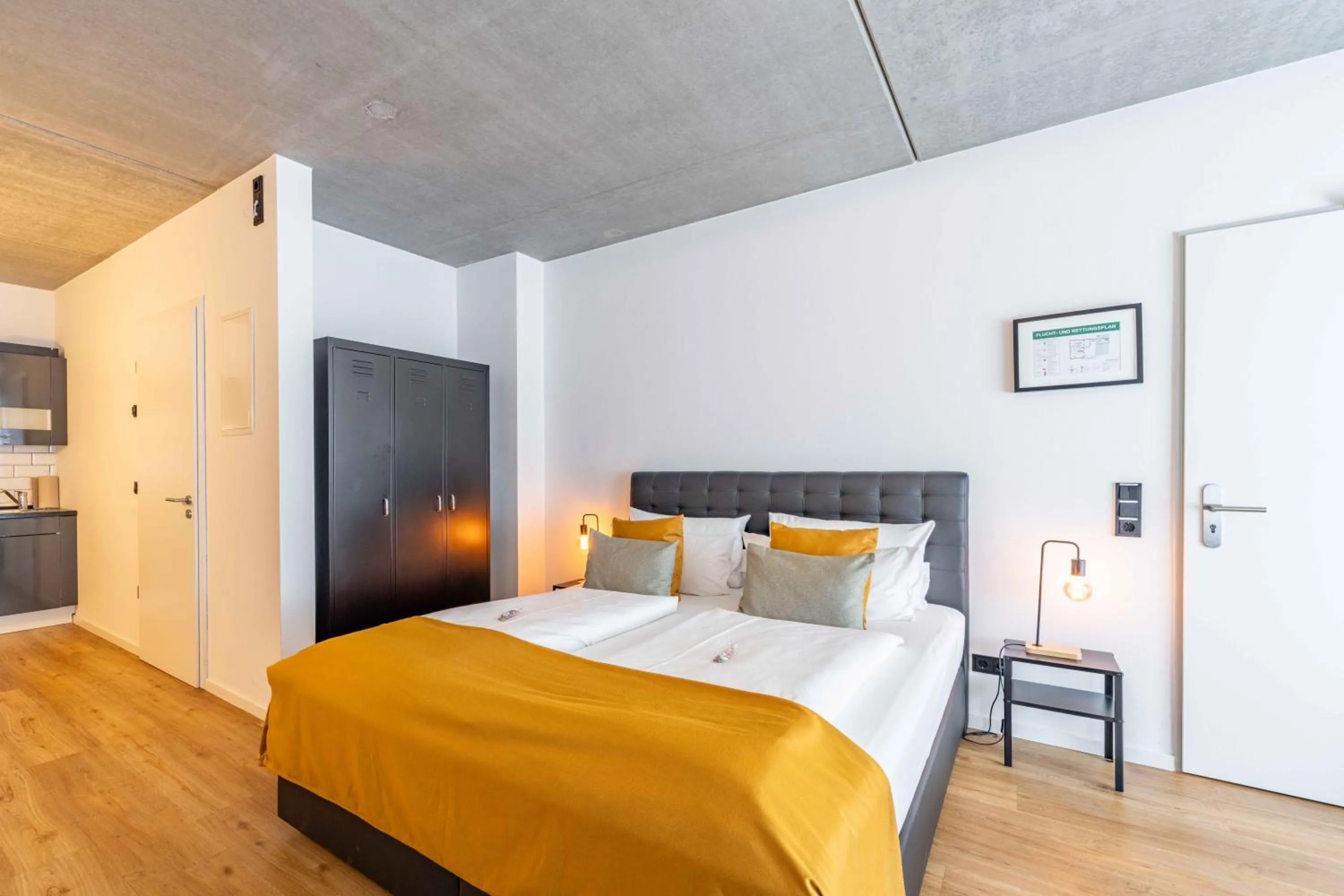 Bed in LÜTTES LOFT Boutique Hotel