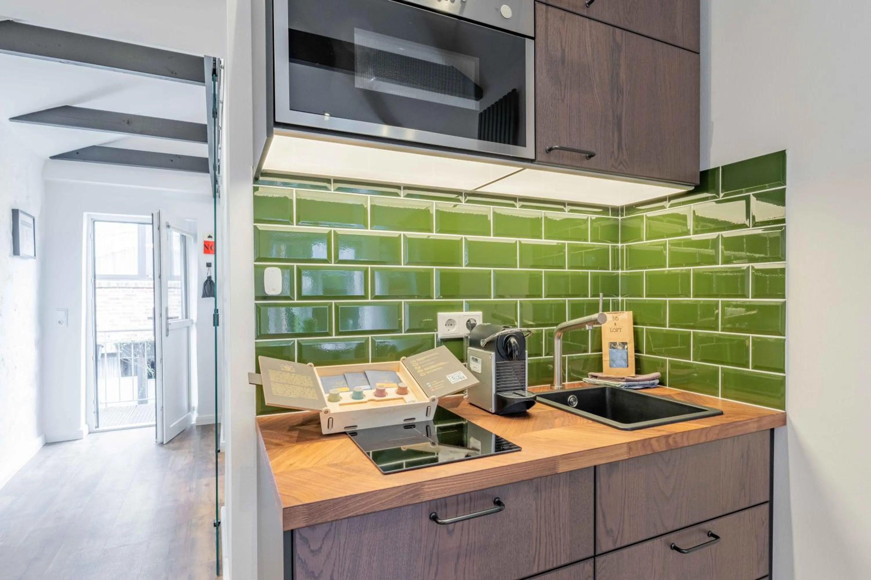 Kitchen or kitchenette in LÜTTES LOFT Boutique Hotel