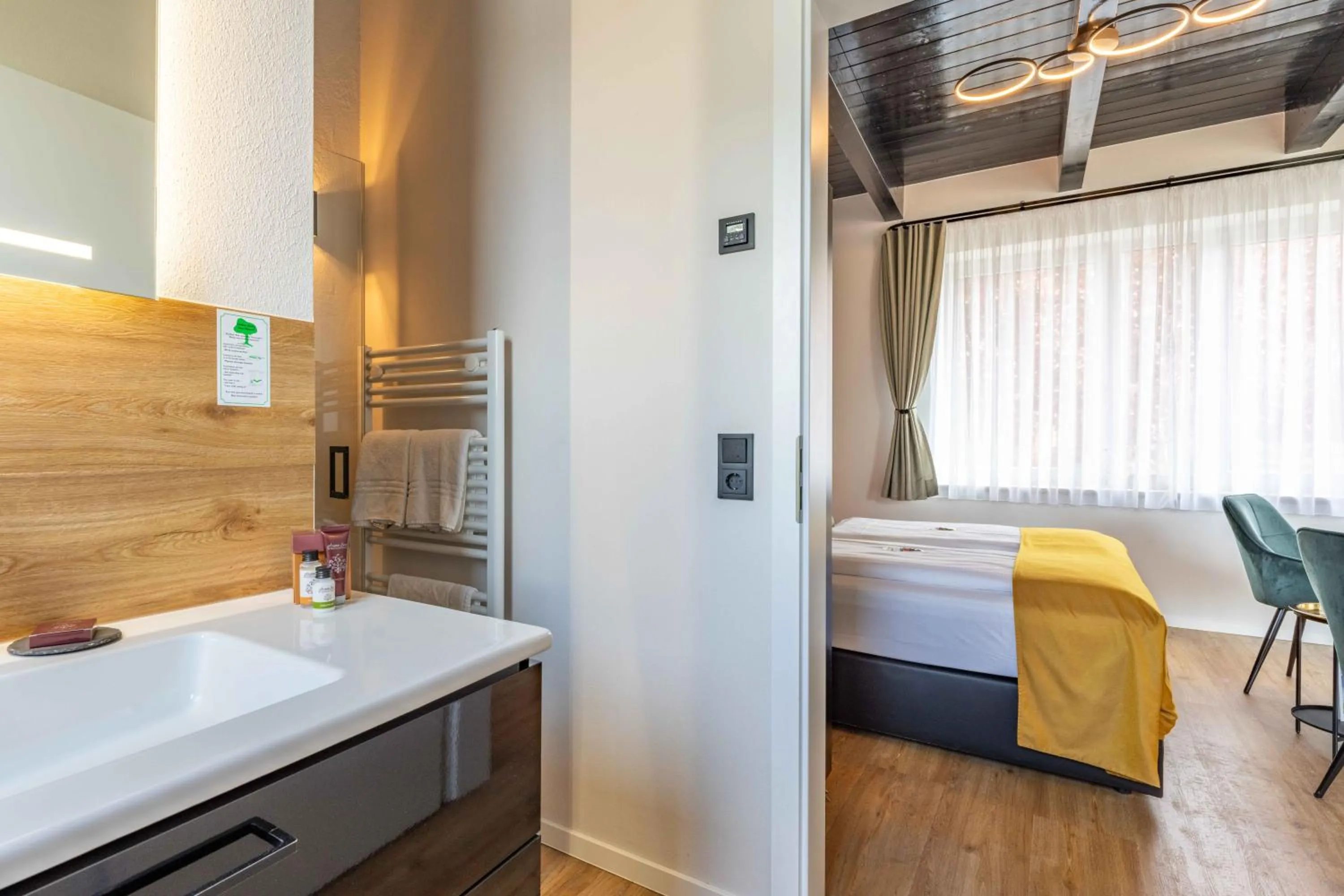 Bed in LÜTTES LOFT Boutique Hotel