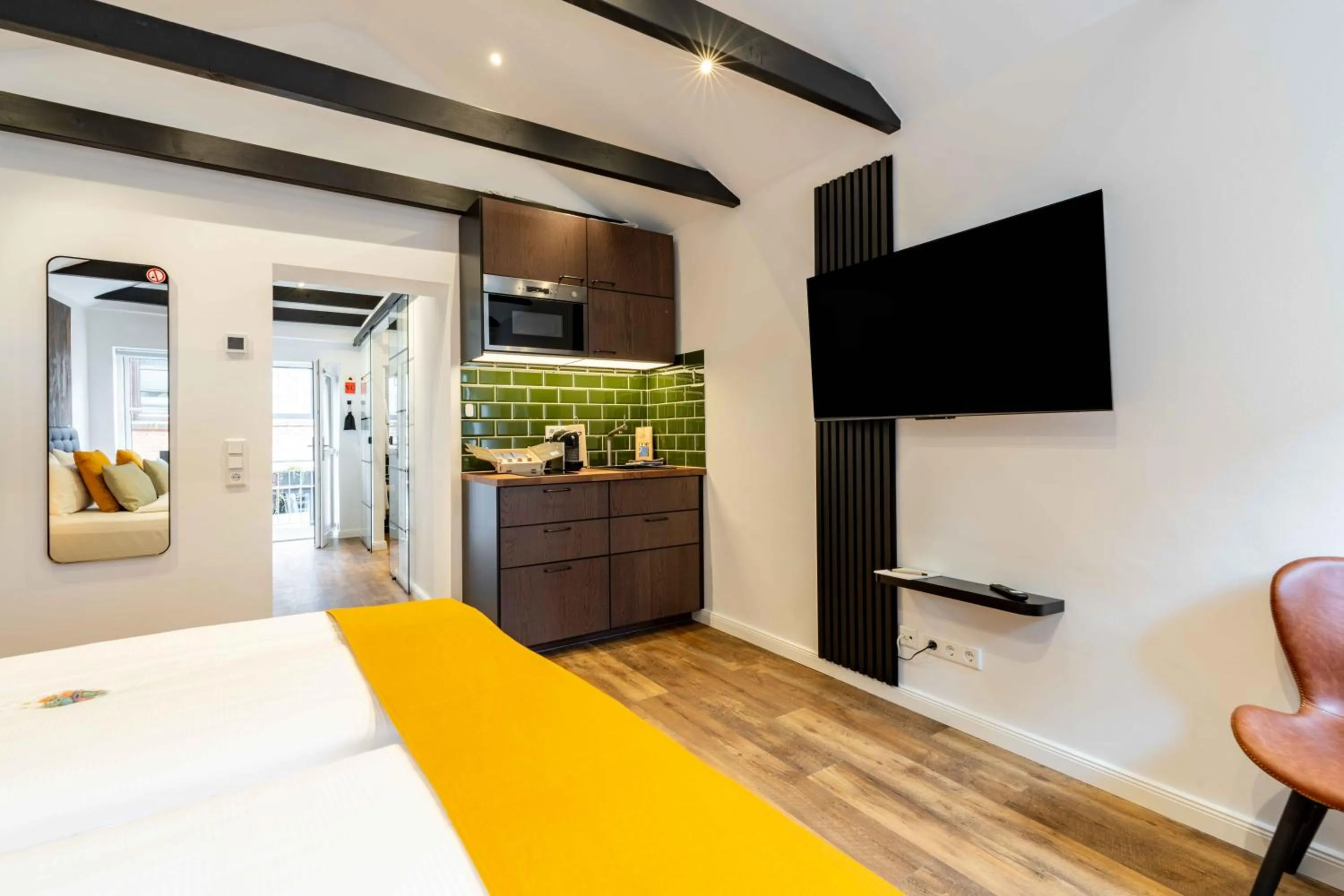 Bed in LÜTTES LOFT Boutique Hotel