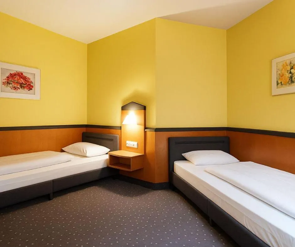 Bed in Plaza Hotel & Living Frankfurt