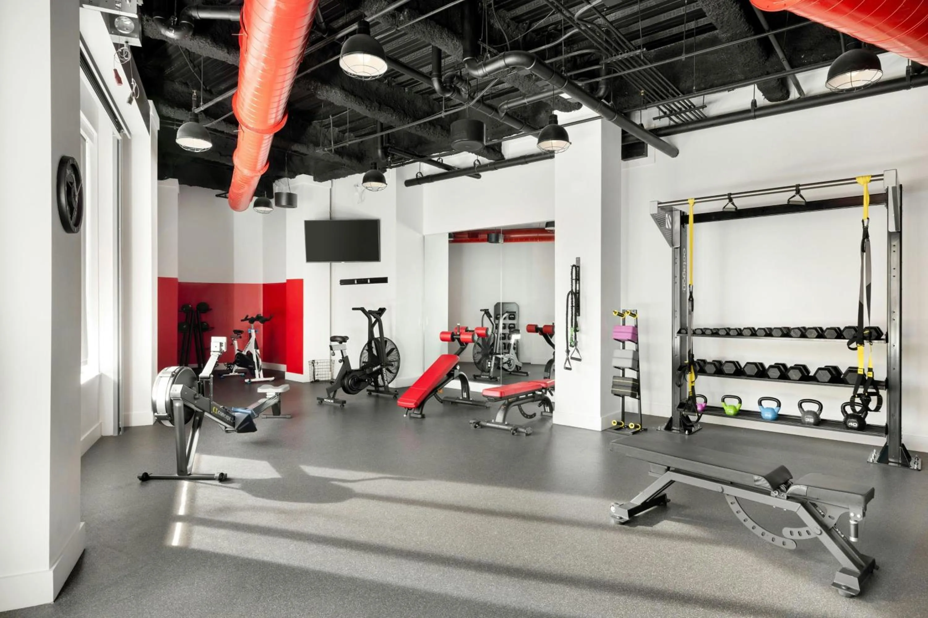 Fitness centre/facilities in The Casso, Raleigh, a Tribute Portfolio Hotel