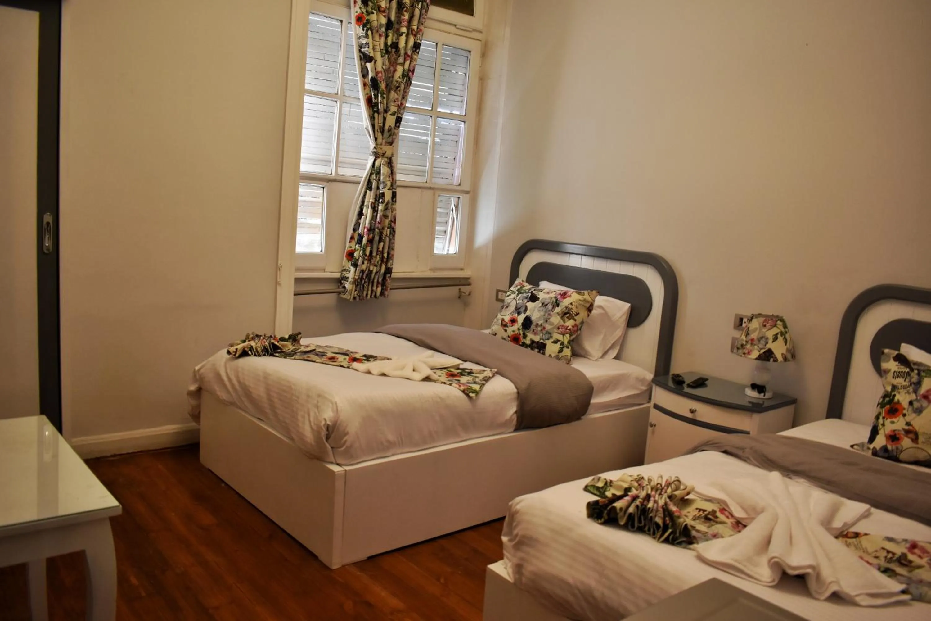 Photo of the whole room, Bed in columbia sky city hotel