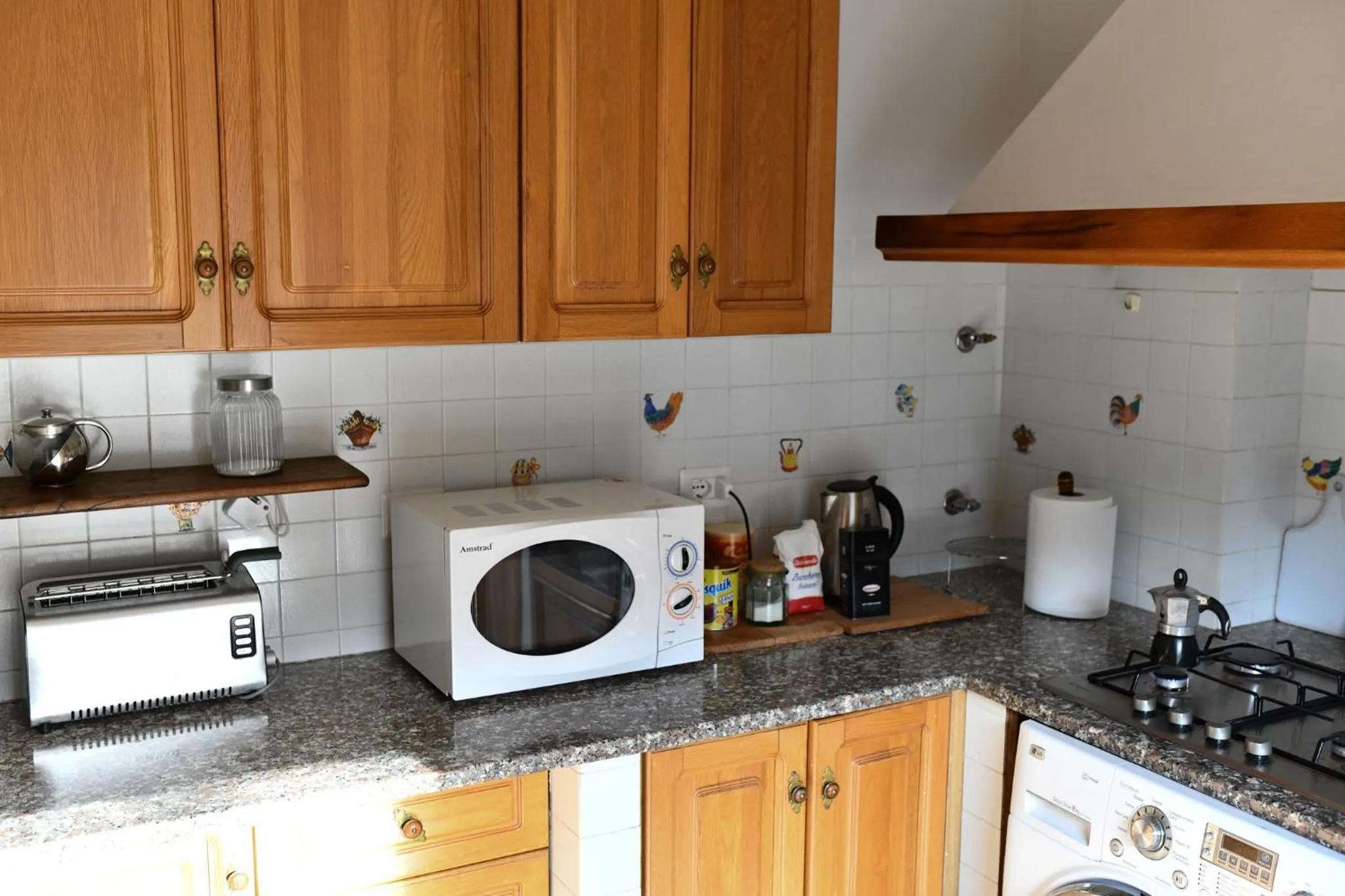 Kitchen or kitchenette in B&B Porta Romana-Language And Art