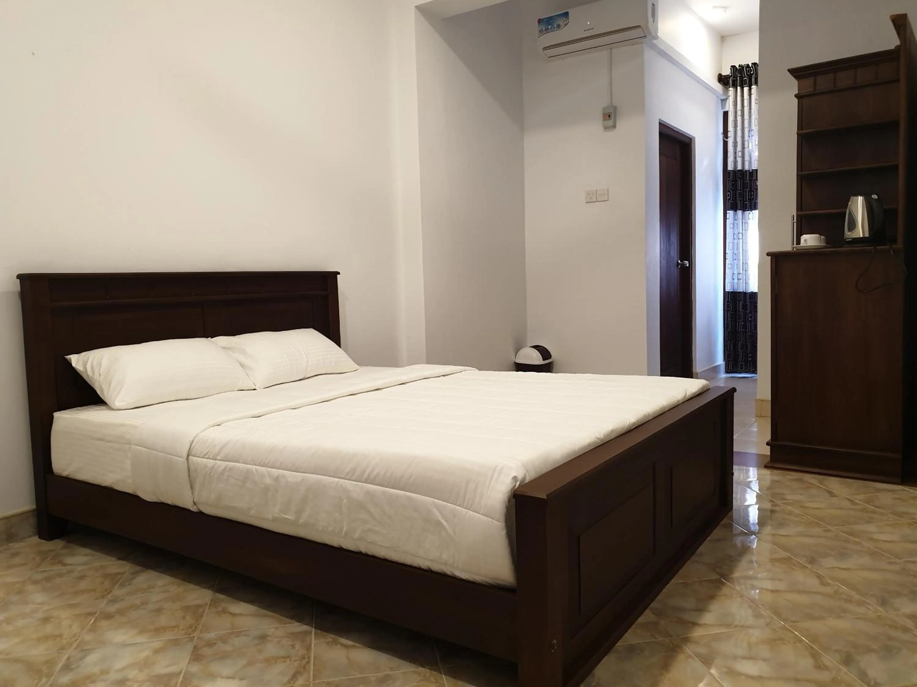 Bed in Grand Villa Kalametiya