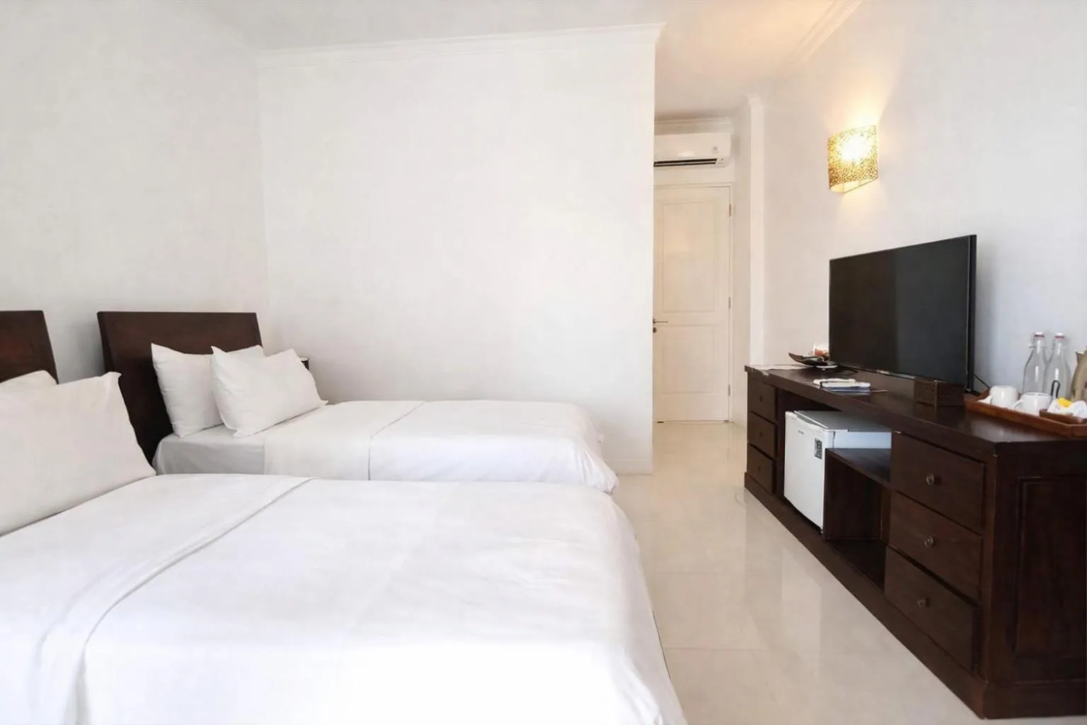 Bed in Lumiere Hotel Gili Trawangan