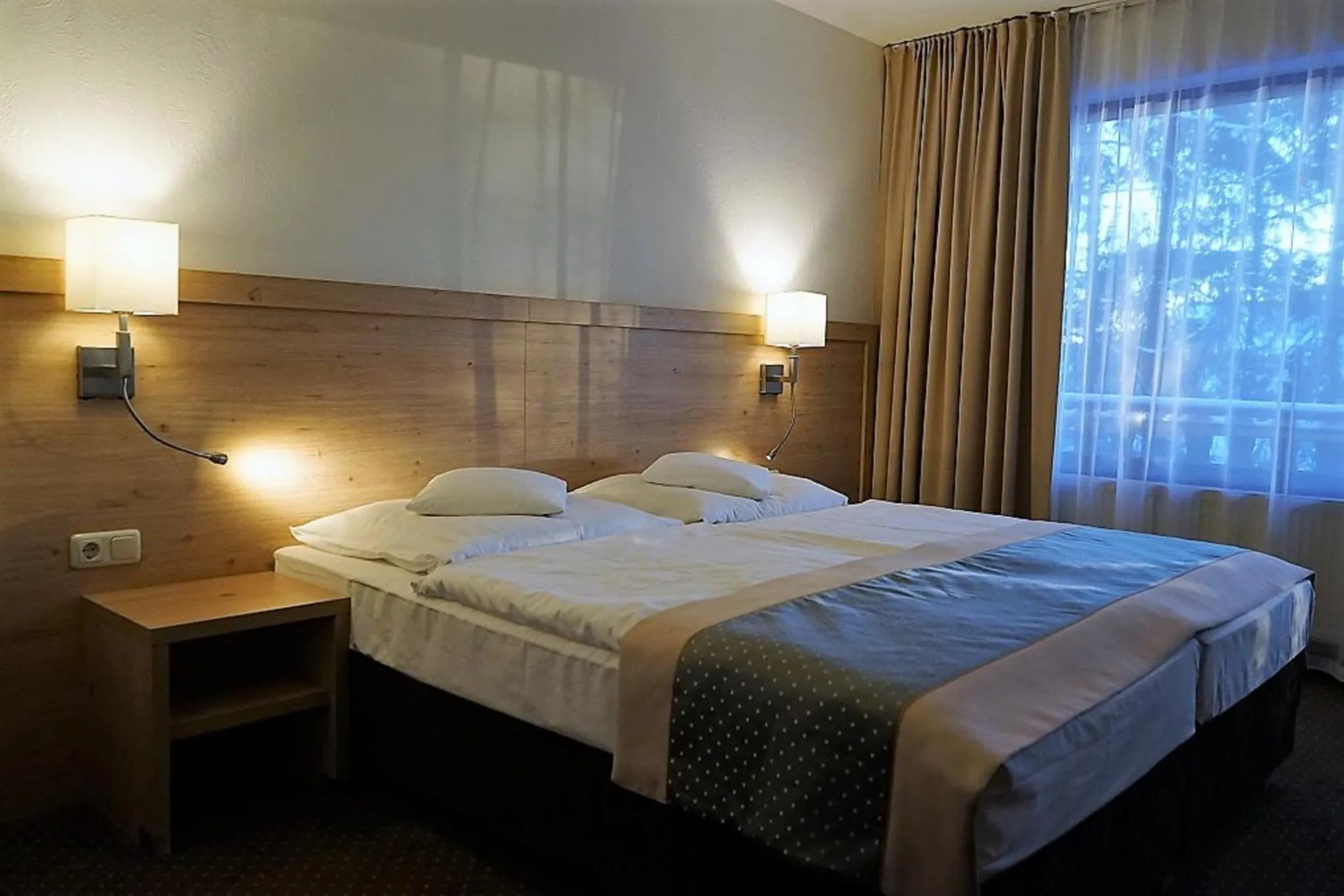 Bed in Land-gut-Hotel Zum alten Forsthaus - Aufladestation für Elektroautos