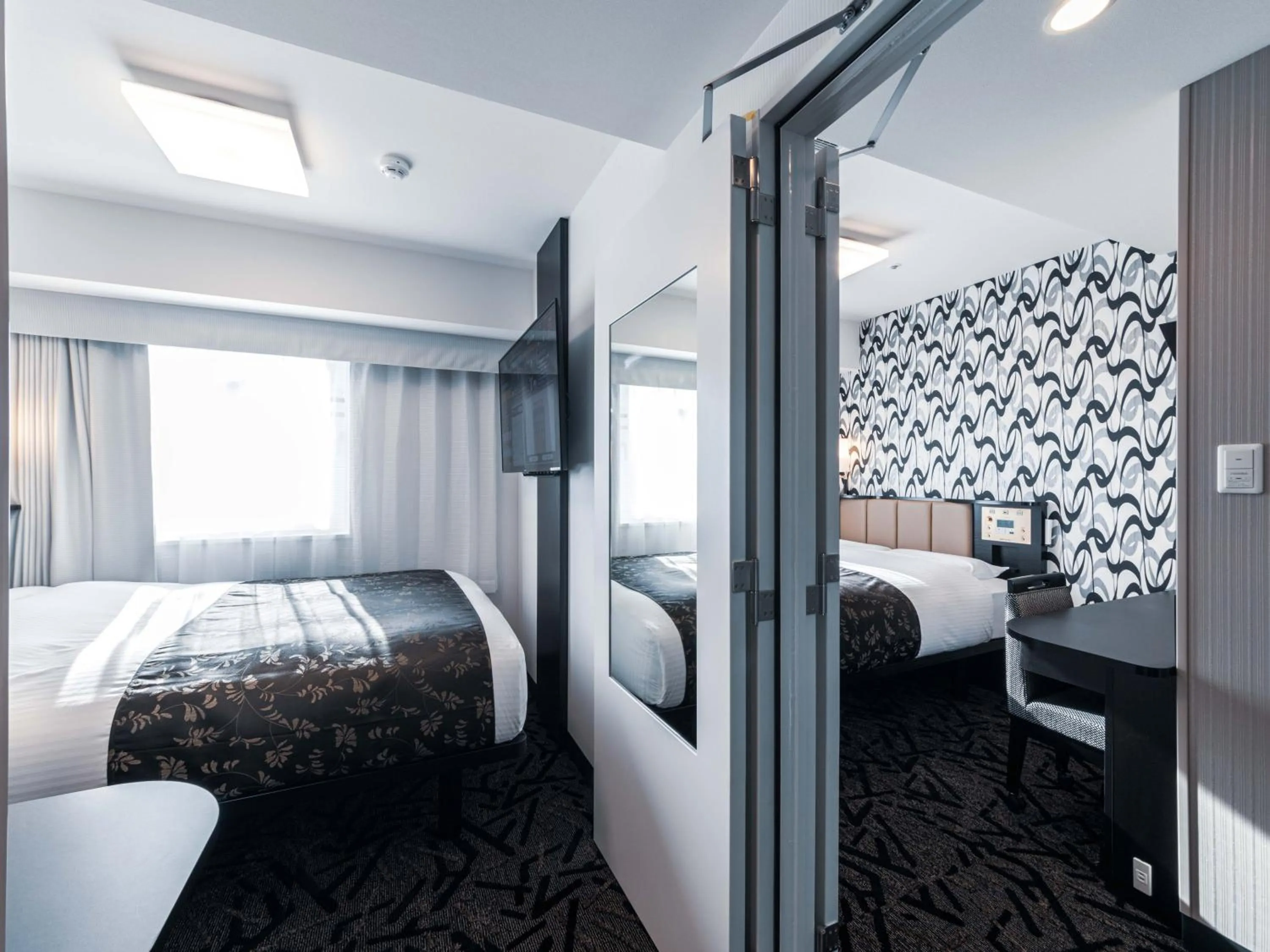 Photo of the whole room, Bed in APA Hotel Shin Osaka Ekimae