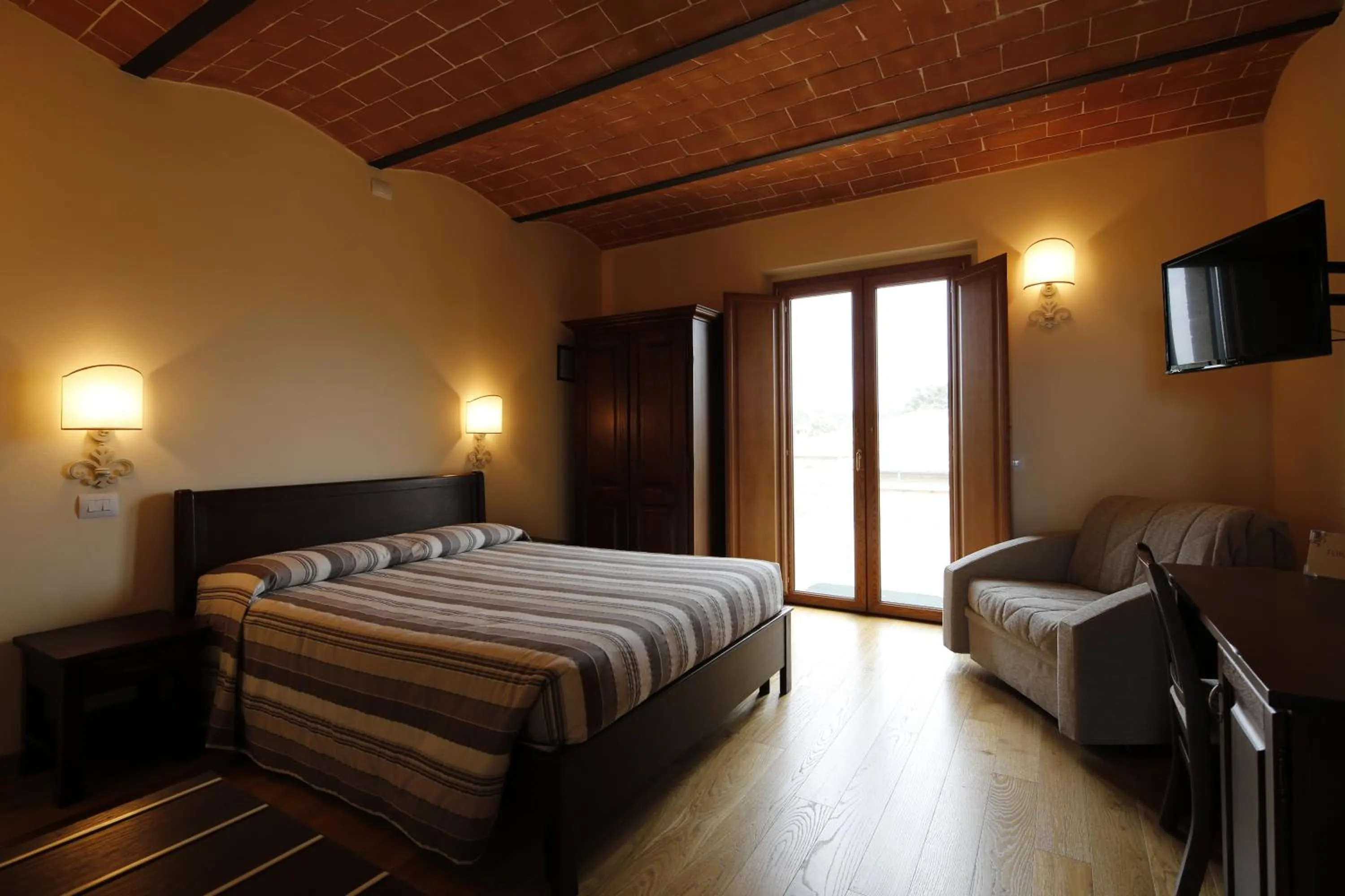 Bed in Agriturismo Poggio Al Tufo