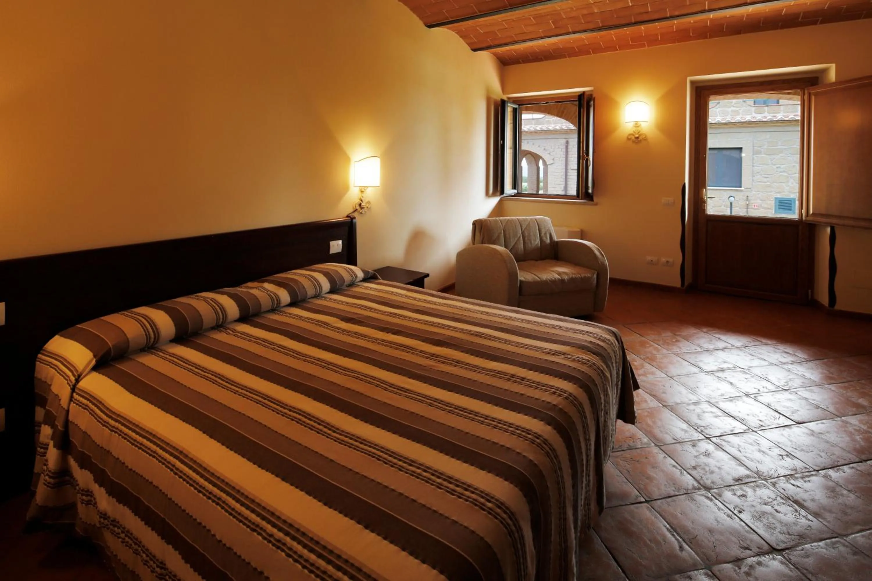 Bed in Agriturismo Poggio Al Tufo
